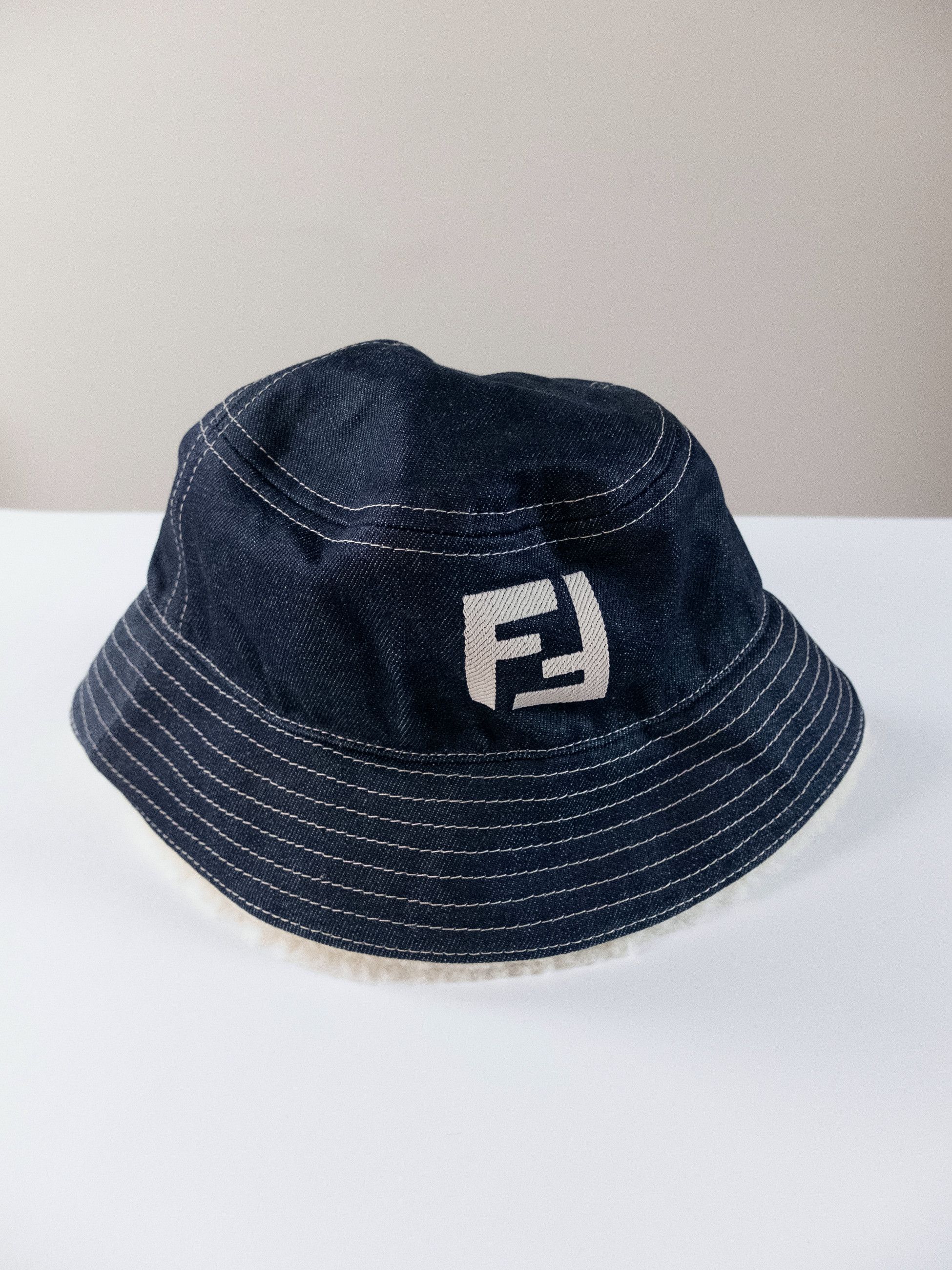 FENDI F logo Shearling trimmed blue denim bucket hat