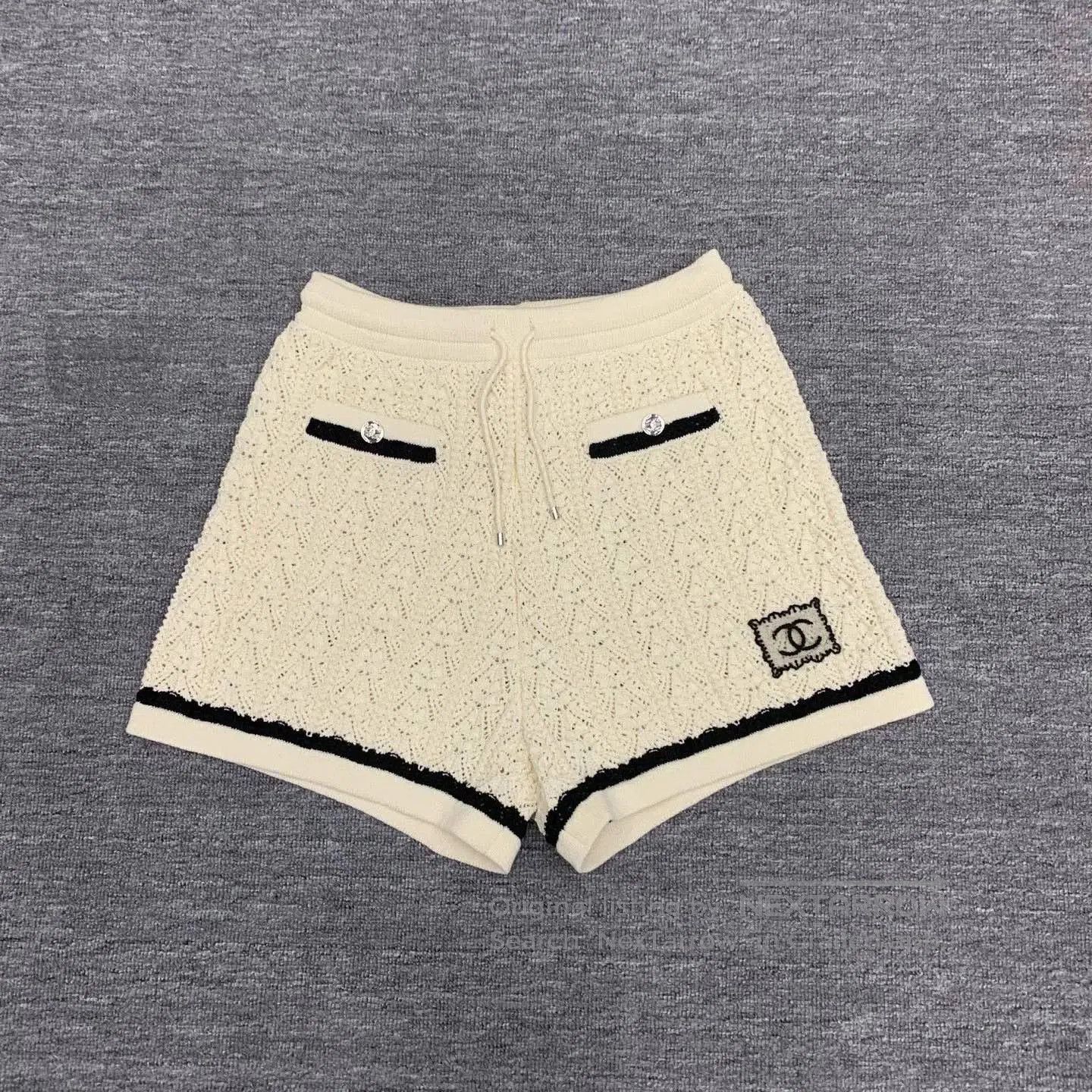 Chanel beige embroidered logo knit shorts. Size 35" - 1 Thumbnail