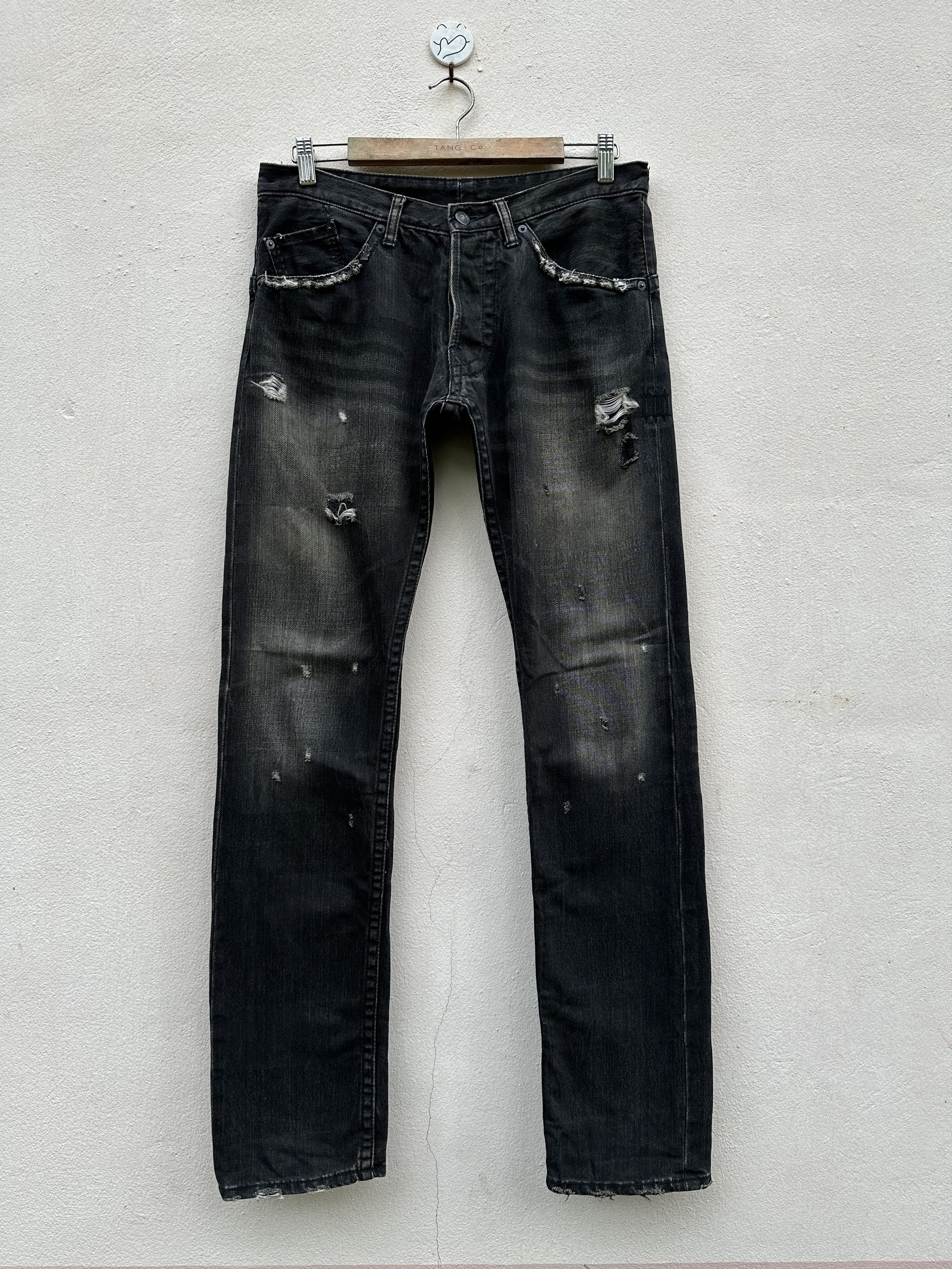 image of Distressed Denim x Yasuyuki Ishii Vintage Troiso Distressed Flare Denim Jeans (Size 32)