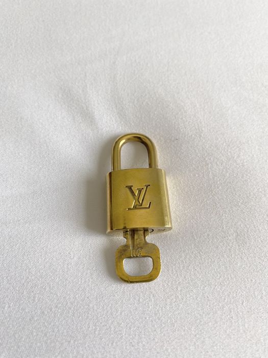 Louis Vuitton, Accessories, Authentic Louis Vuitton Lv Set Padlock Key  Bag Charm Cadena Gold Plated