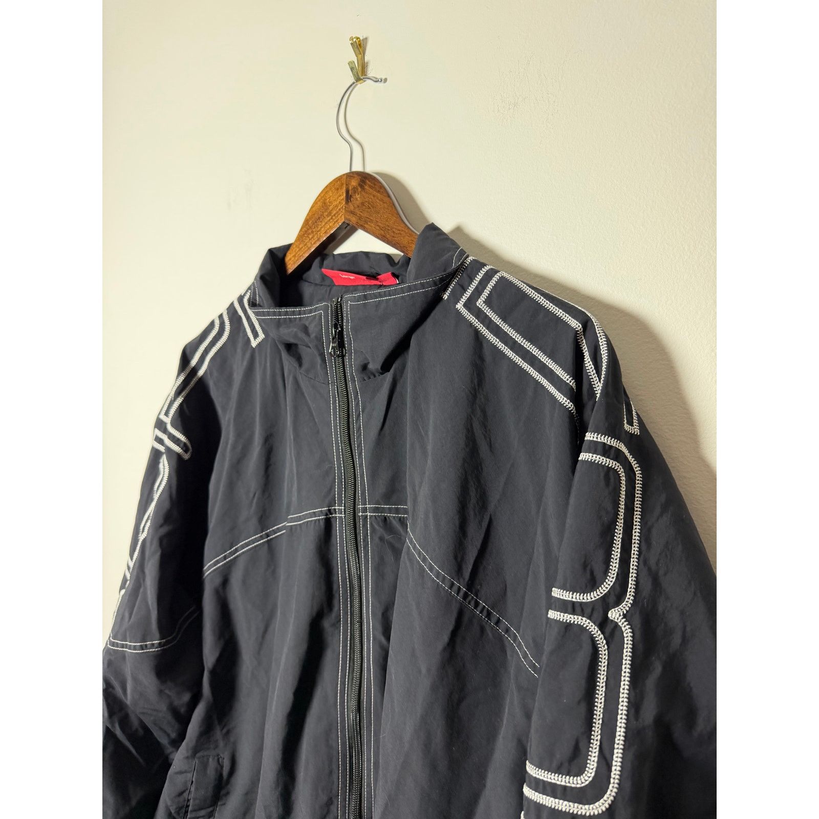 Supreme spellout embroidered track jacket black
