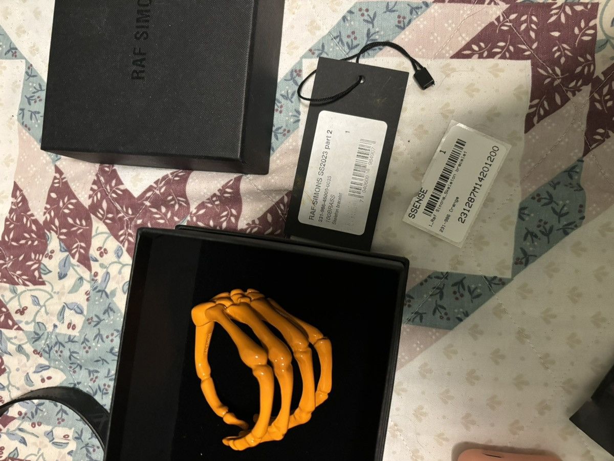 image of Raf Simons Raf Simon’S Skeleton Bracelet in Orange, Men's