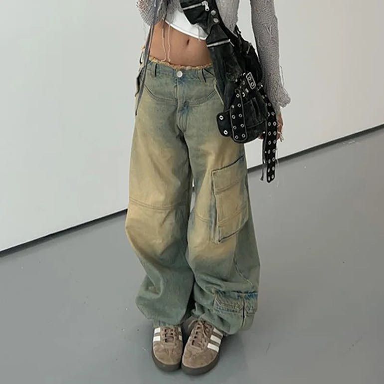 image of Vintage Women Low Waisted Baggy Cargo Jeans in Blue (Size 28)