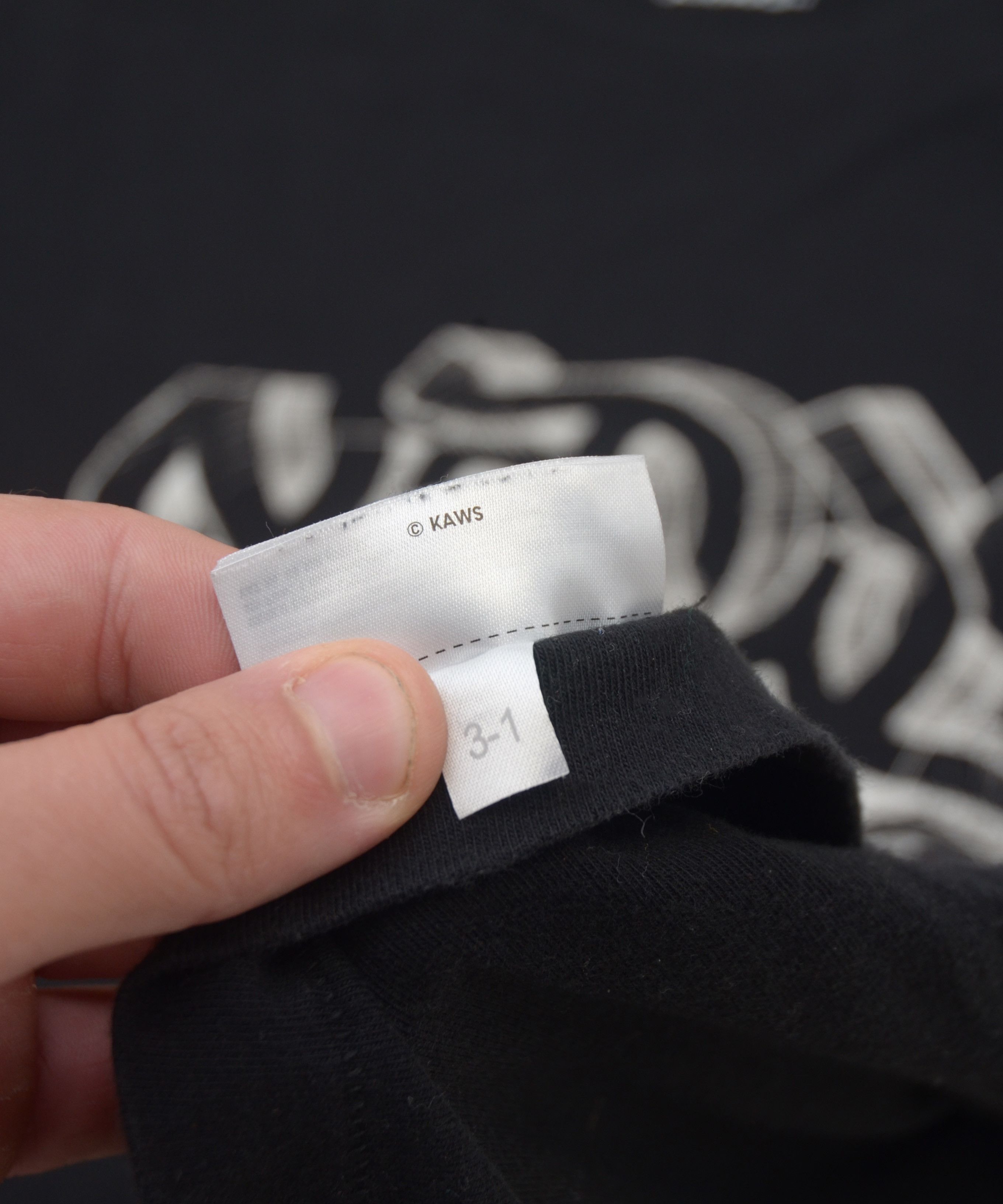 Kaws × Uniqlo Kaws x Uniqlo UT Graffiti Tank Black T-Shirt L size Size US XL / EU 56 / 4 - 9 Thumbnail