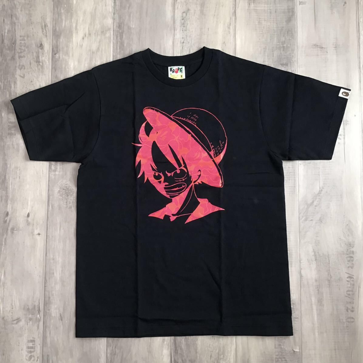 image of Bape × Onepiece Red Camo Luffy T-Shirt A Bathing Ape in Black, Men's (Size Medium)