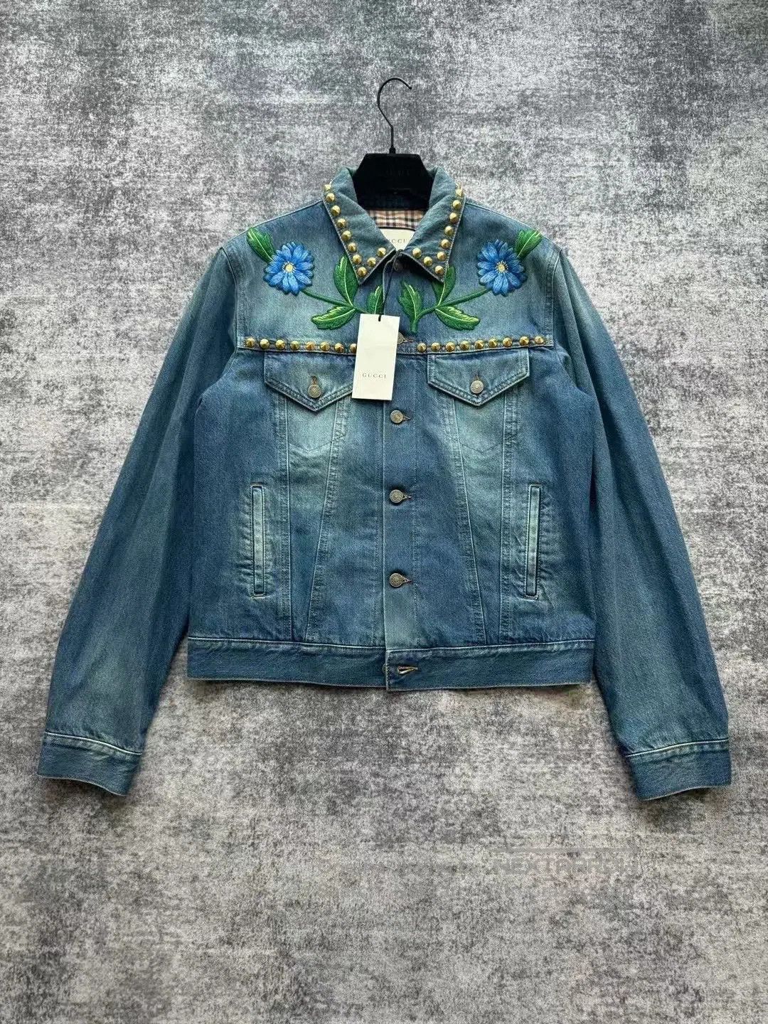 gucci embroidered denim jacket with studs.