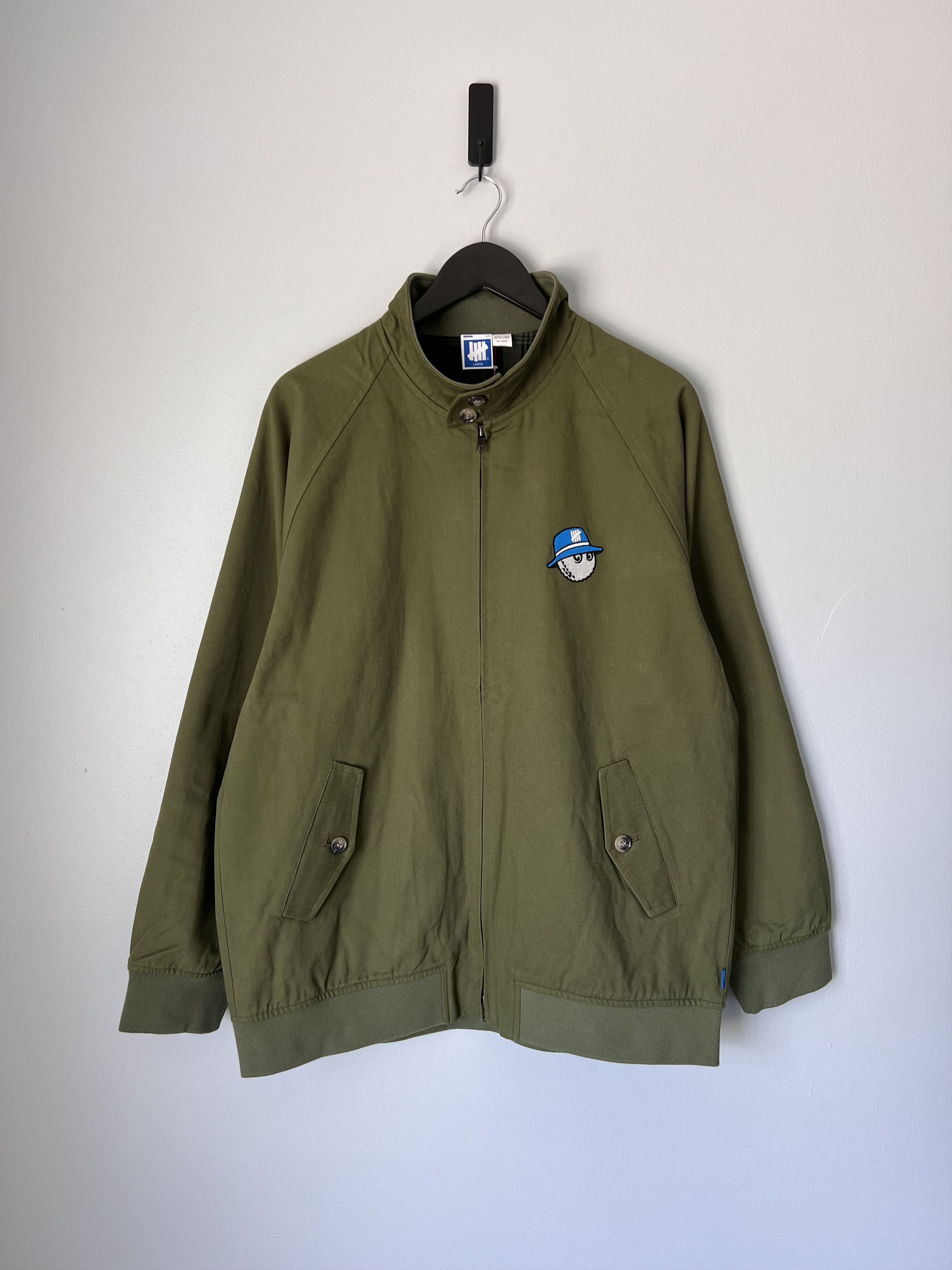 Malbon × Undefeated Undefeated Malbon Golf Zip Jacket in