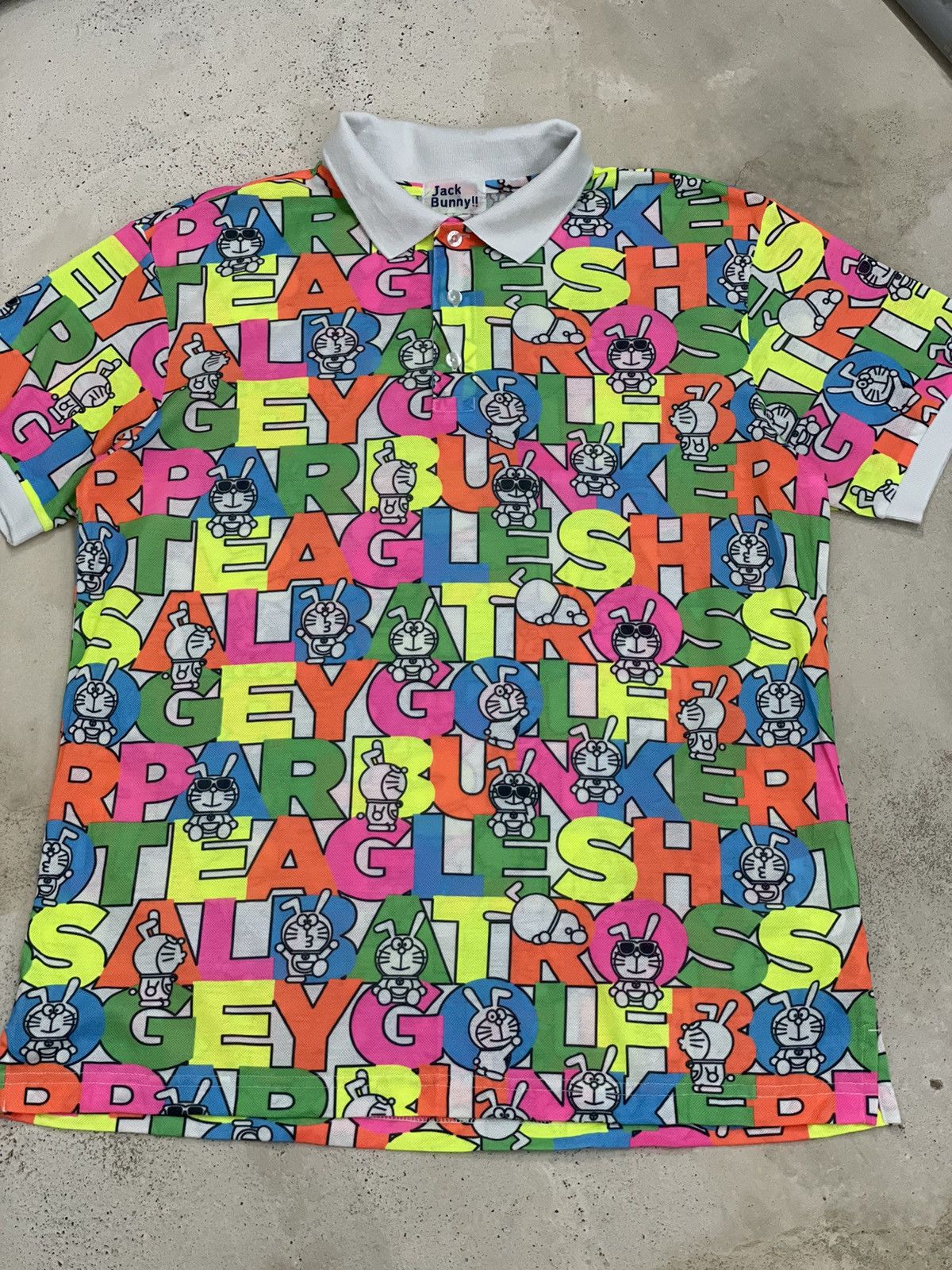 Anime × Japanese Brand × Psycho Bunny Jack Bunny Doraemon Polo Fullprint Wording Colorful Size US L / EU 52-54 / 3 - 4 Thumbnail