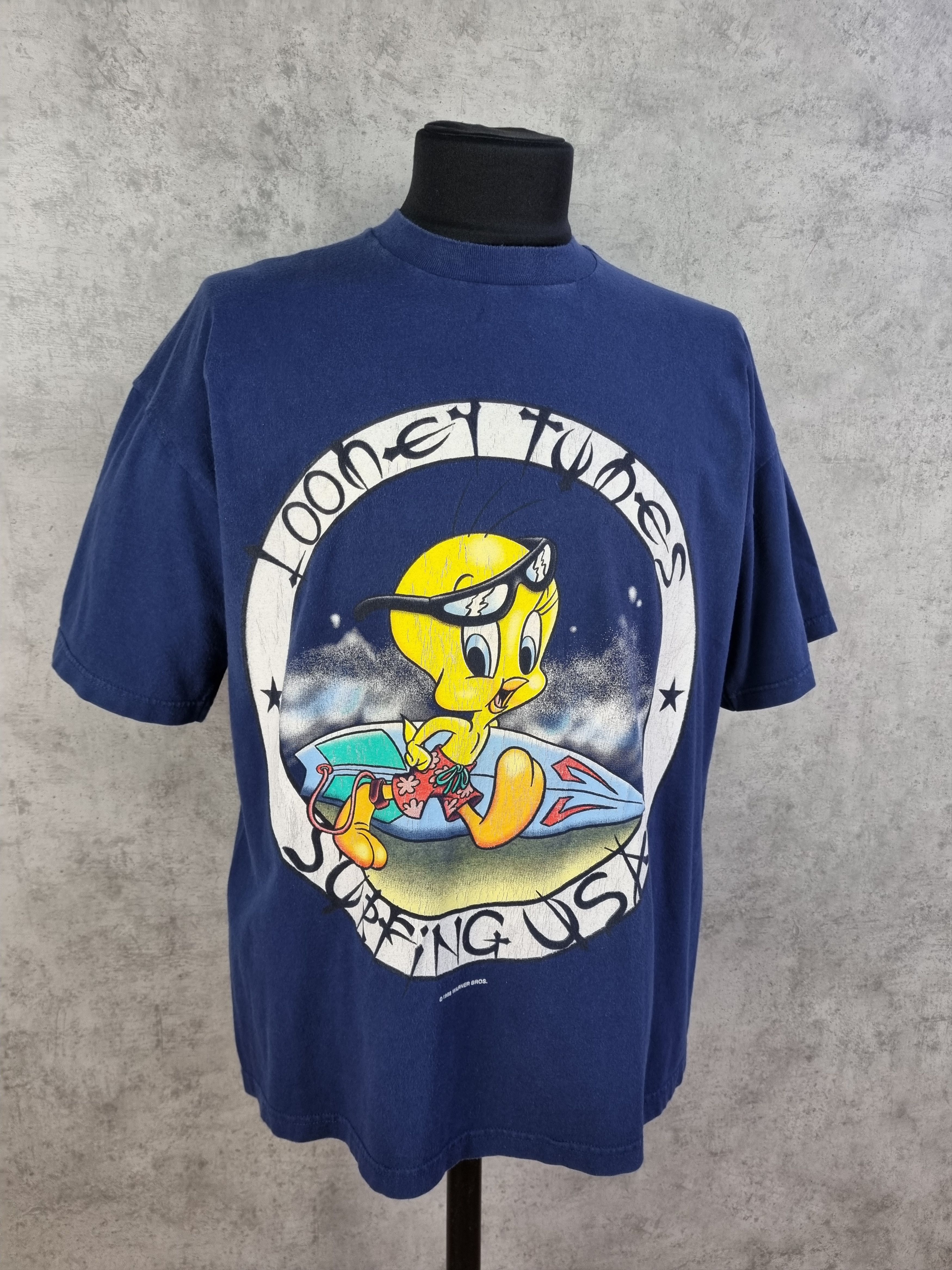 image of Disney x Vintage '98 Warner Bros. Looney Tunes Surfing Usa Tweety Bird Tee in Faded Navy (Size XL)