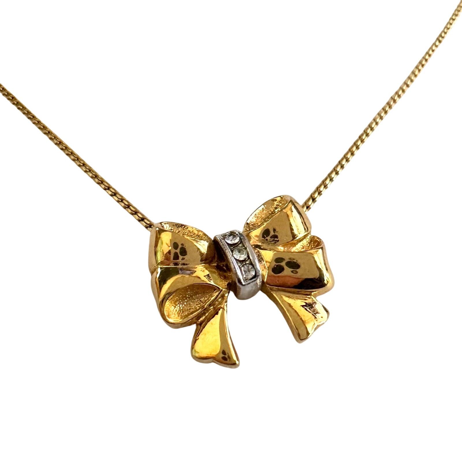 Yves Saint Laurent Yves Saint Laurent Gold and Rhinestone Bow Necklace Size ONE SIZE - 4 Thumbnail