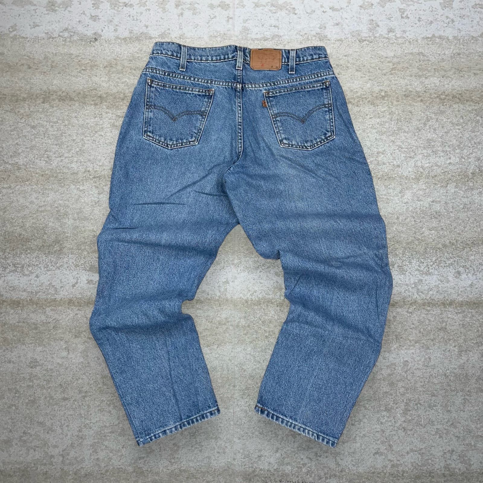 image of Crazy Vintage 90's Levis 550 Jeans Orange Tab Relaxed Tapered in Blue, Men's (Size 34)