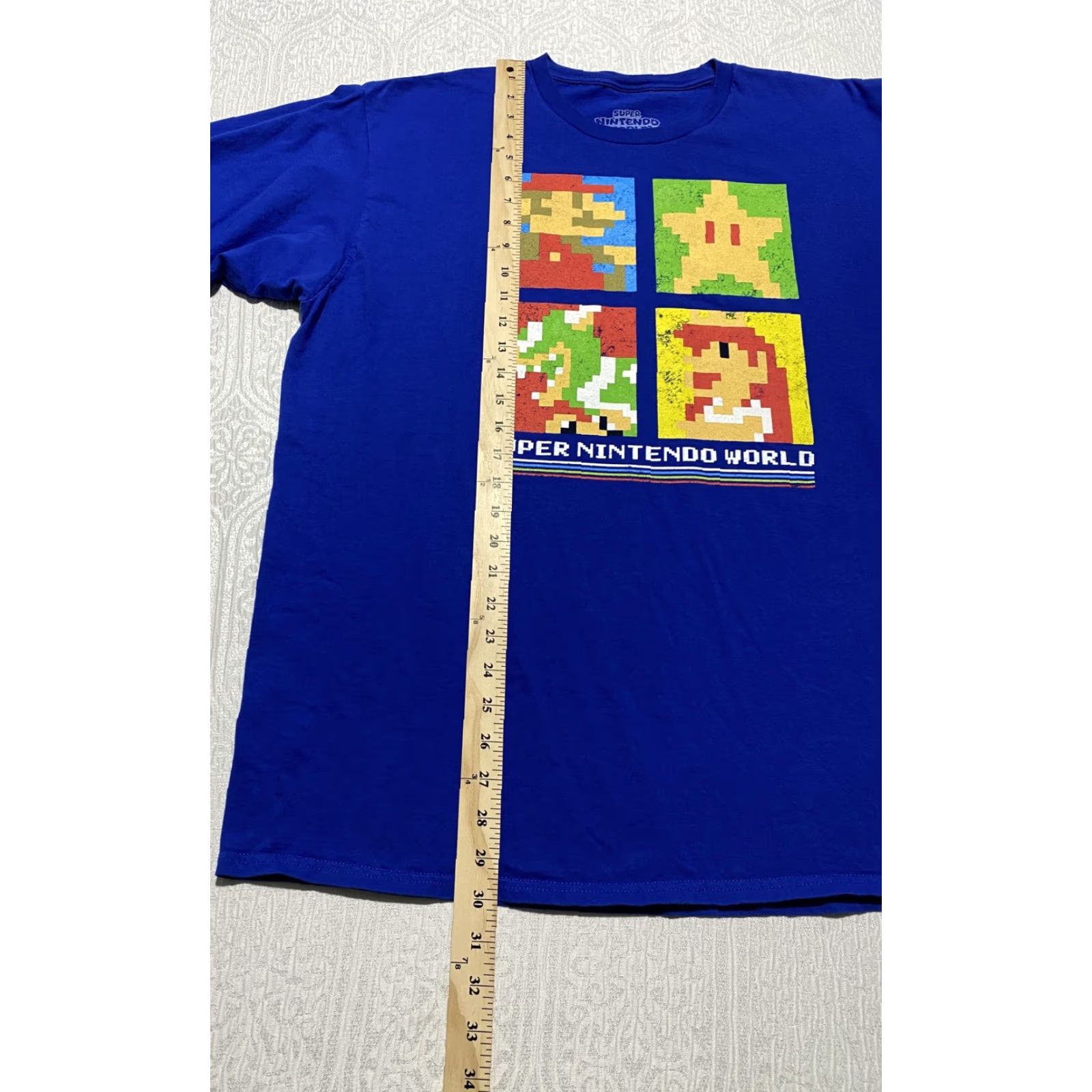 Nintendo VINTAGE Super Nintendo World Shirt Mens 2XL Blue Mario Bowser Peach Graphic Tee Size US XXL / EU 58 / 5 - 3 Thumbnail