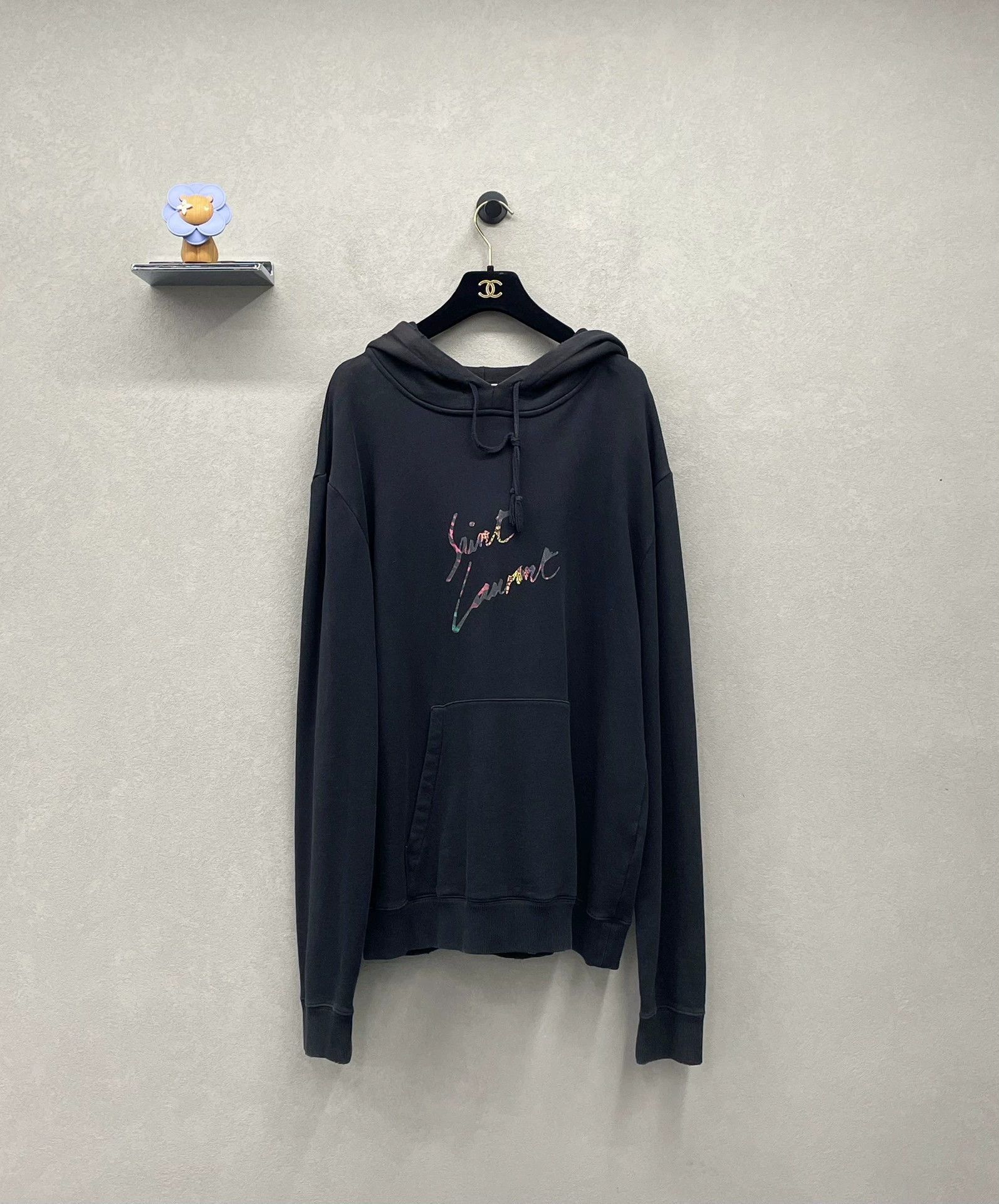 black hoodie with rainbow logo by saint laurent