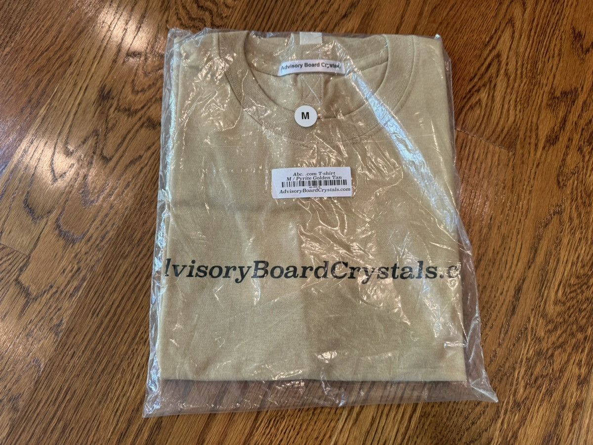 Advisory Board Crystals Medium ABC Website Tee Gold Tan Shirt abc 123. Size US M / EU 48-50 / 2 - 2 Thumbnail