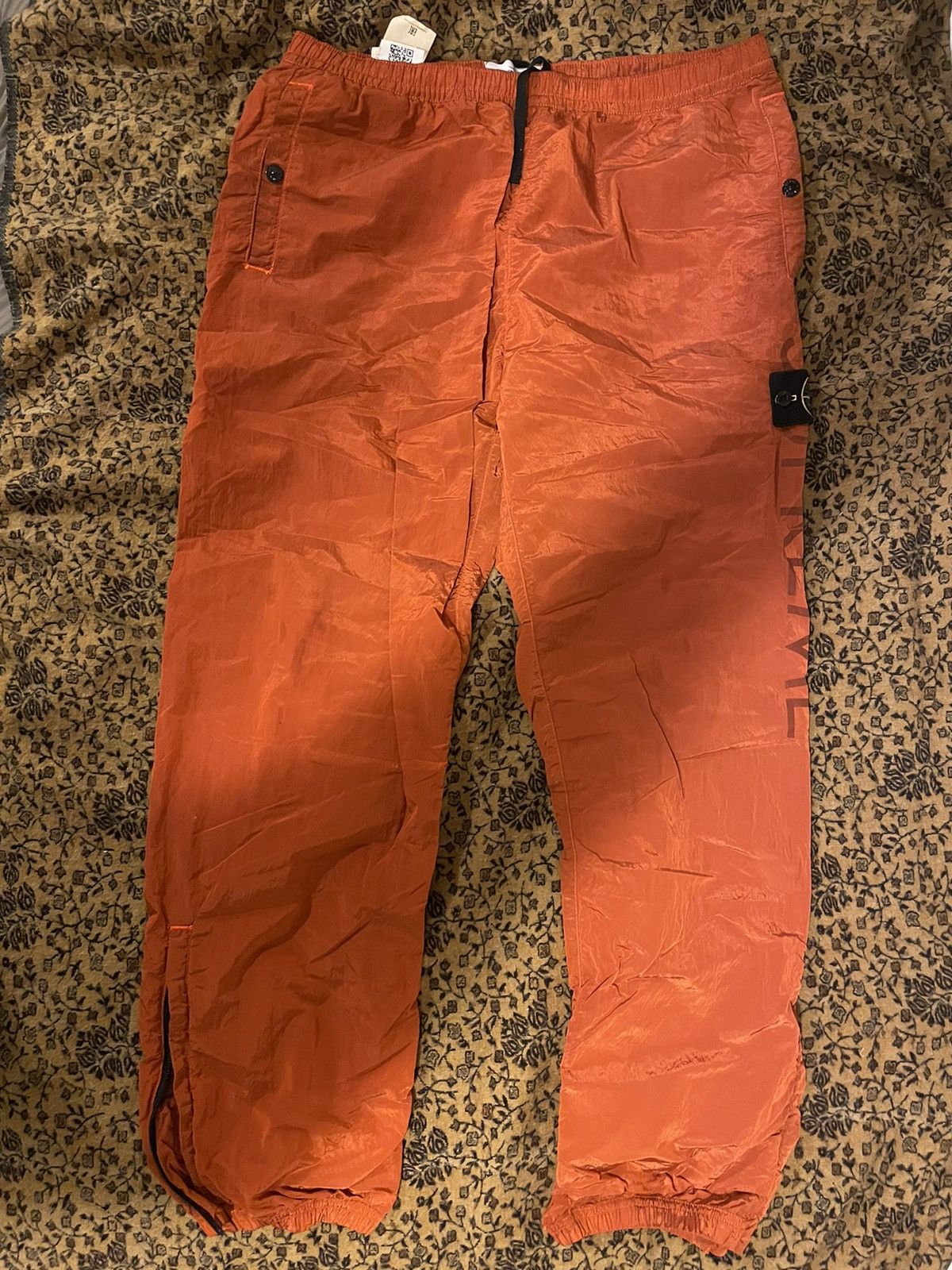 image of Stone Island Supreme Nylon Metal Pant in Orange, Men's (Size 32)