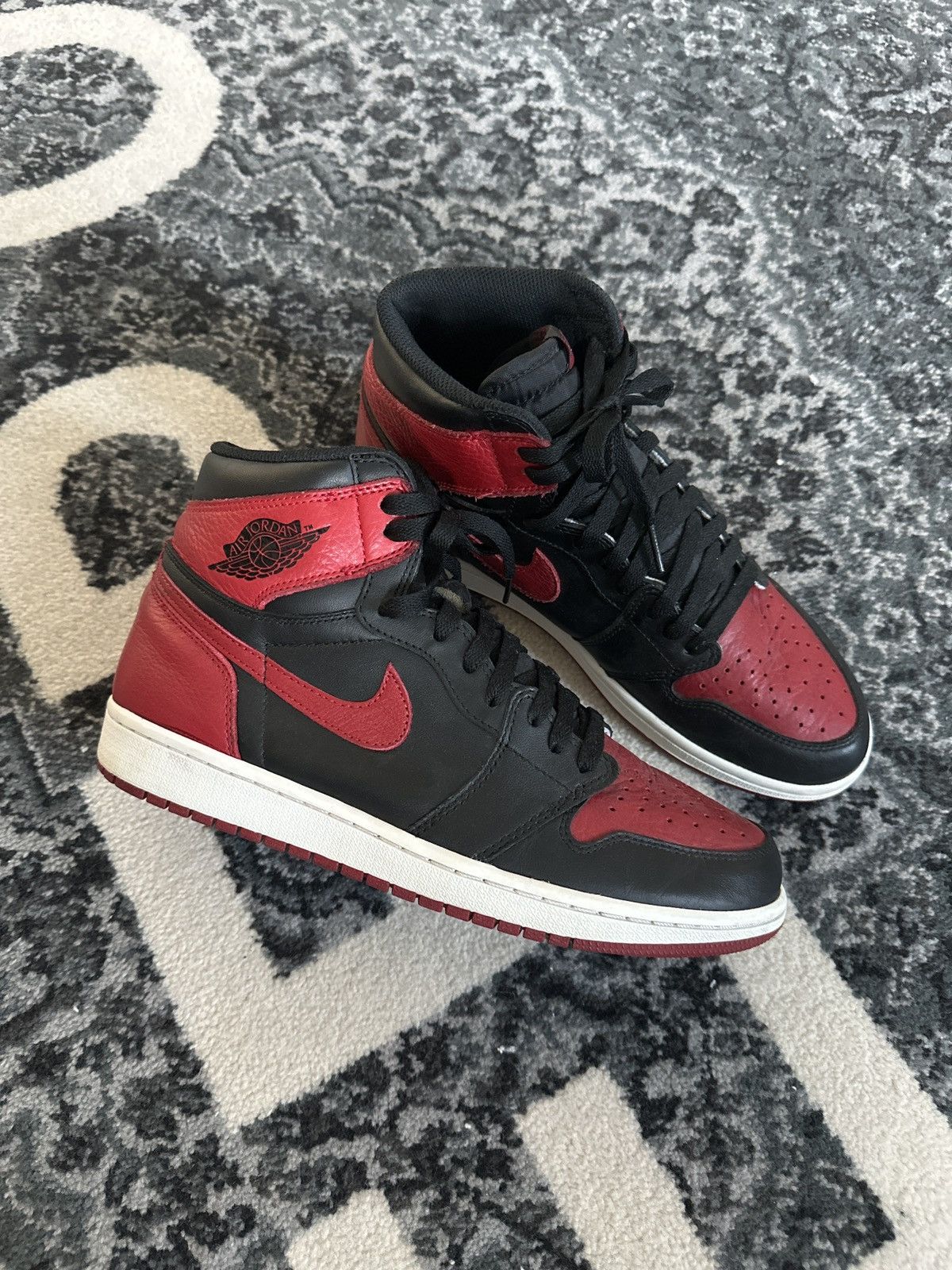 image of Air Jordan 1 Retro High Bred Banned 2016 Shoes in Black Red, Men's (Size 10)