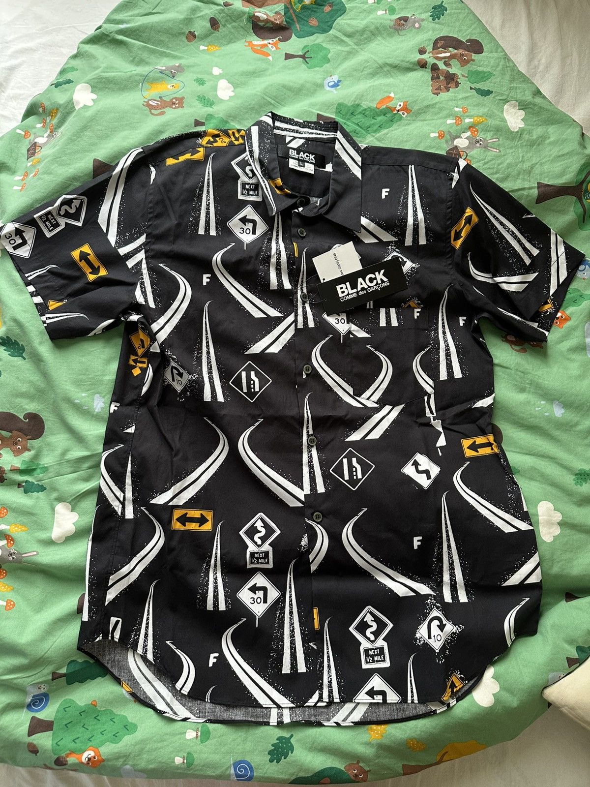 Black Comme des Garcons graphic shirt