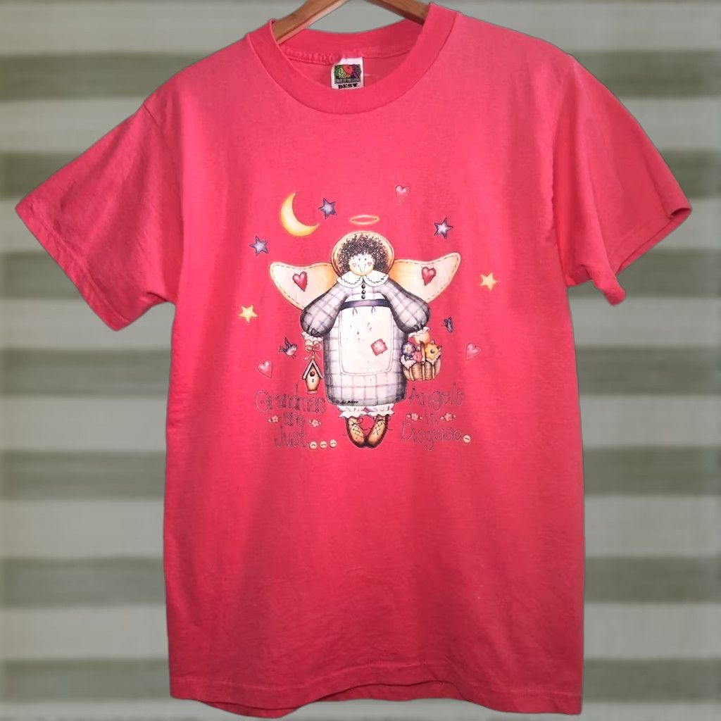 Fruit Of The Loom VINTAGE Fruit of the Loom BEST Grandma Shirt M Pink Angel Crew Neck Short Sleeve Graphic T-shirt Women? (Note: output must be only rearranged title) Size US M / EU 48-50 / 2 - 1 Thumbnail