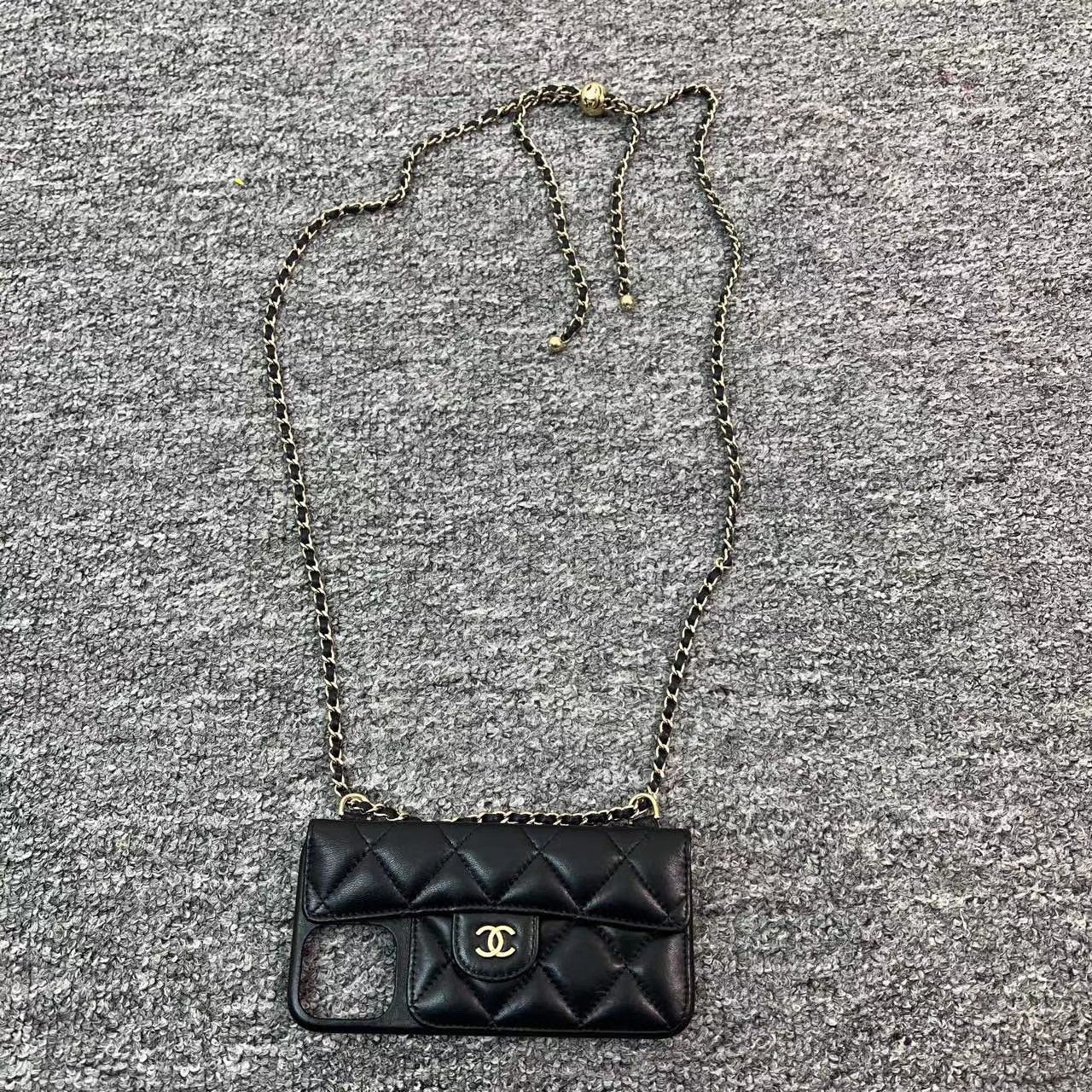 Chanel Chanel Black Lambskin Gold Ball Chain Phone Case K12 Size ONE SIZE - 1 Thumbnail