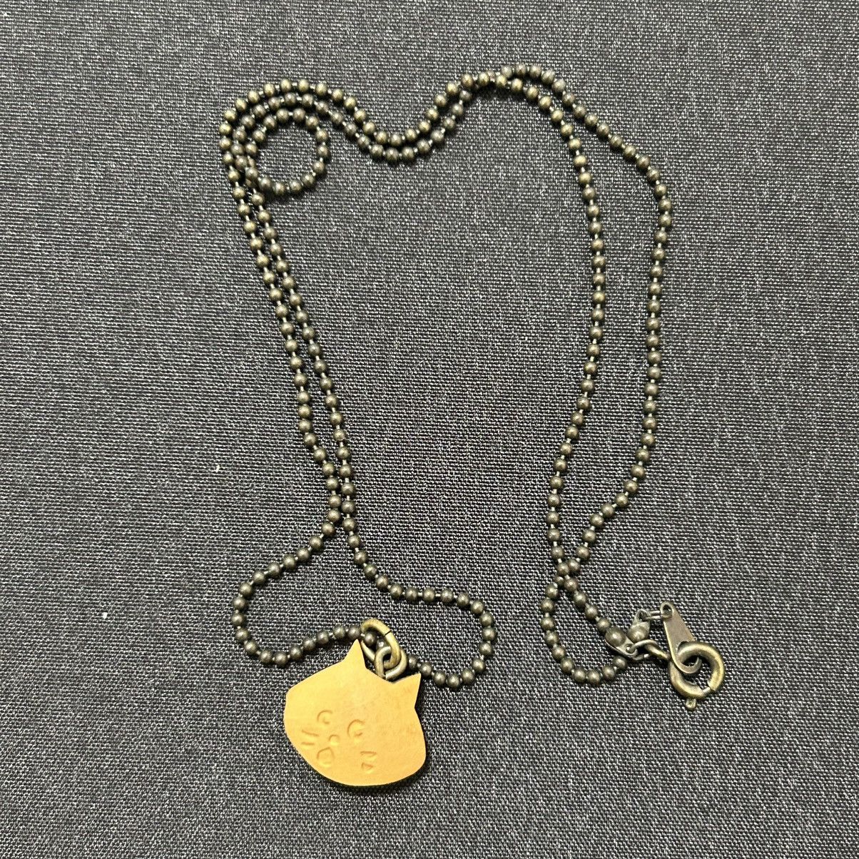 image of Issey Miyake x Ne Net Ne-Net Necklace in Brown, Men's