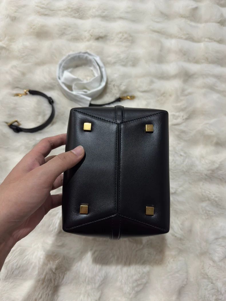 Saint Laurent Paris Small black gold cowhide bucket hobo b