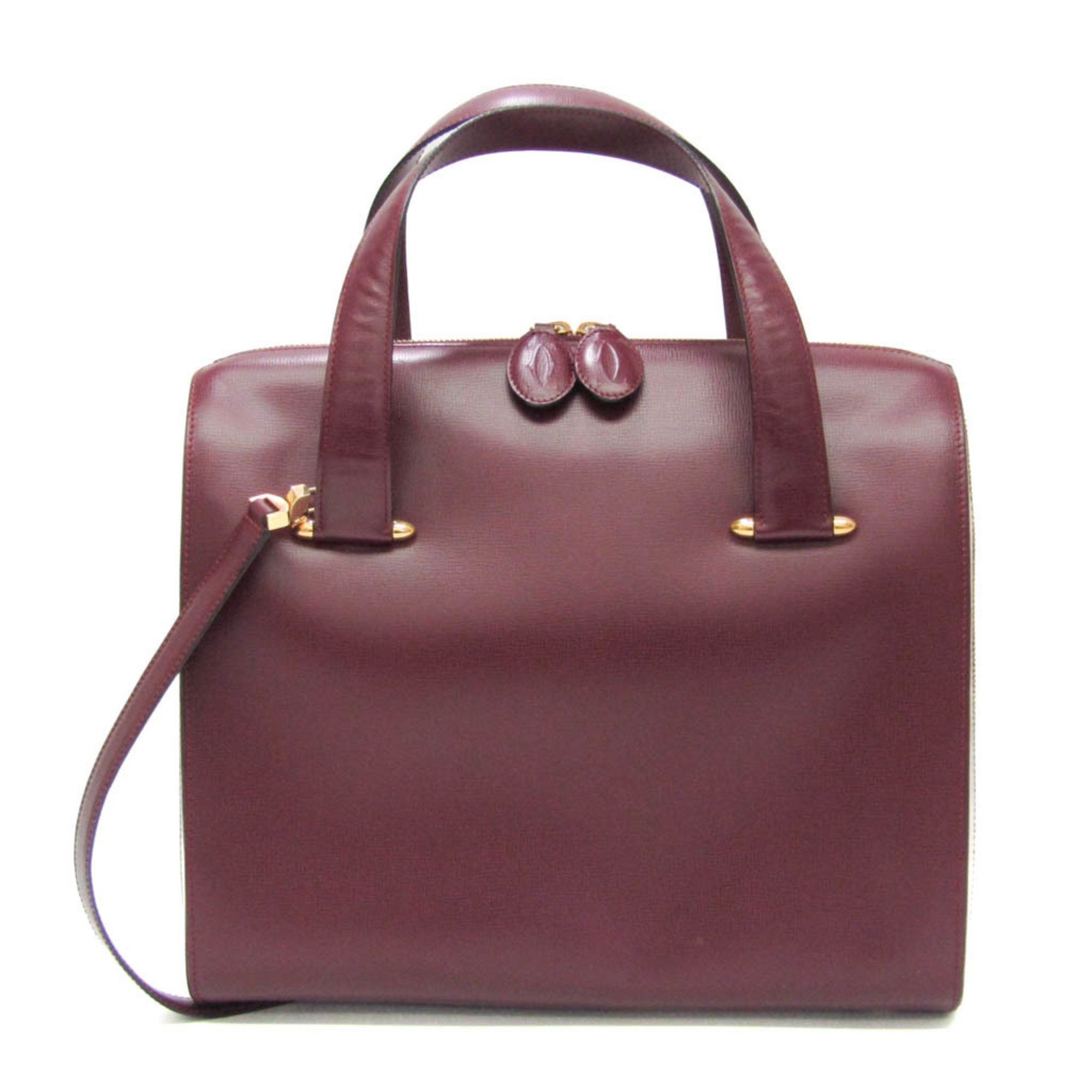 image of Cartier Must De Cartier Handbag in Burgundy, Women's