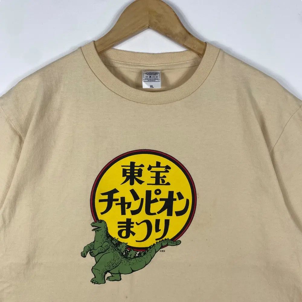 Japanese Brand TOHO CHAMPION FESTIVAL Godzilla Graphic Tee Shirt Size US XL / EU 56 / 4 - 2 Thumbnail