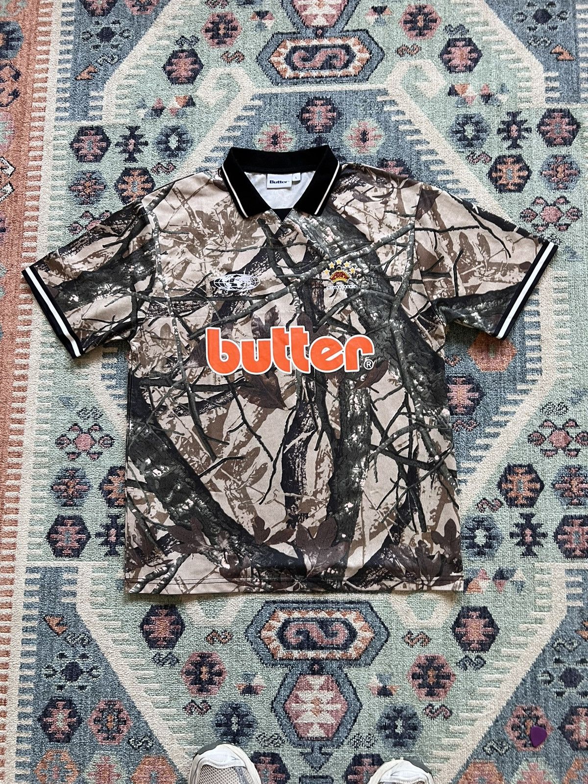 【BUTTER GOODS】Foliage Camo Jersey - Orange Butter Goods Foliage Camo Jersey – Unheardof Brand