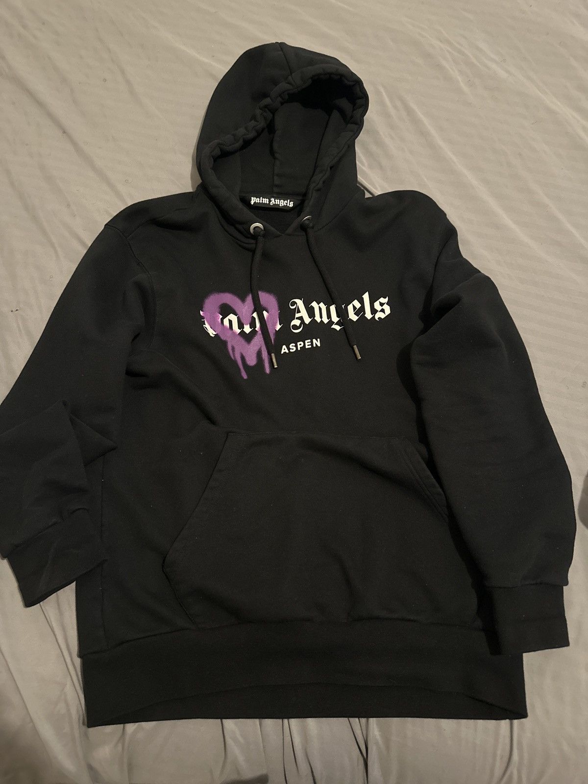 image of Palm Angels Aspen Heart Sprayed Logo Hoodie in Black, Men's (Size Small)