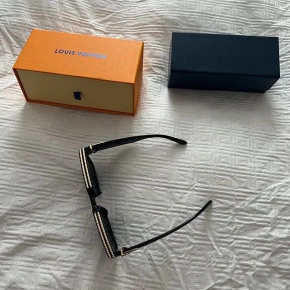 image of Pharrell Louis Vuitton Men's Black Sunglasses in Black Gold