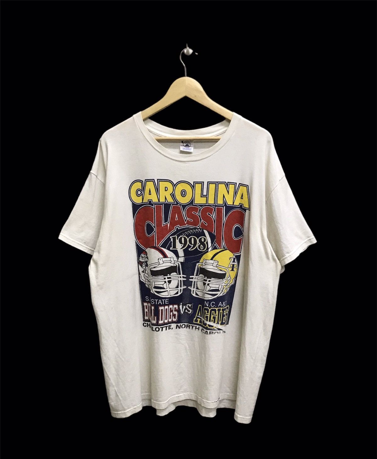 NFL VINTAGE 90s NFLP CAROLINA CLASSIC BULLDOG VS AGGIES TSHIRT Size US XL / EU 56 / 4 - 1 Thumbnail
