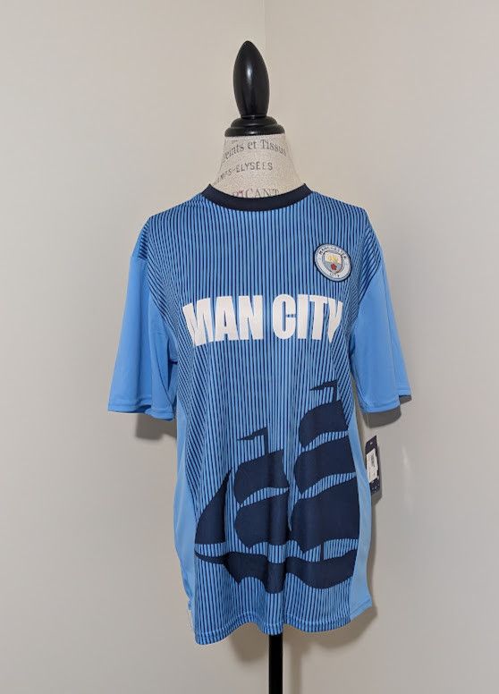 Other Manchester City Offical jersey NWT size L Size US L / EU 52-54 / 3 - 1 Thumbnail