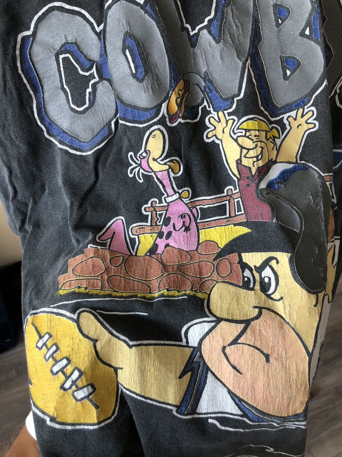Vintage 90s NFL x The Flinstones Dallas Cowboys feded t-shir
