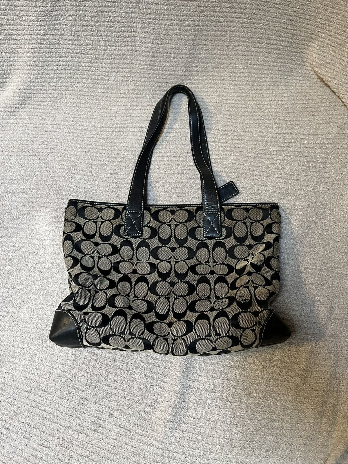 Coach selling authentic bag