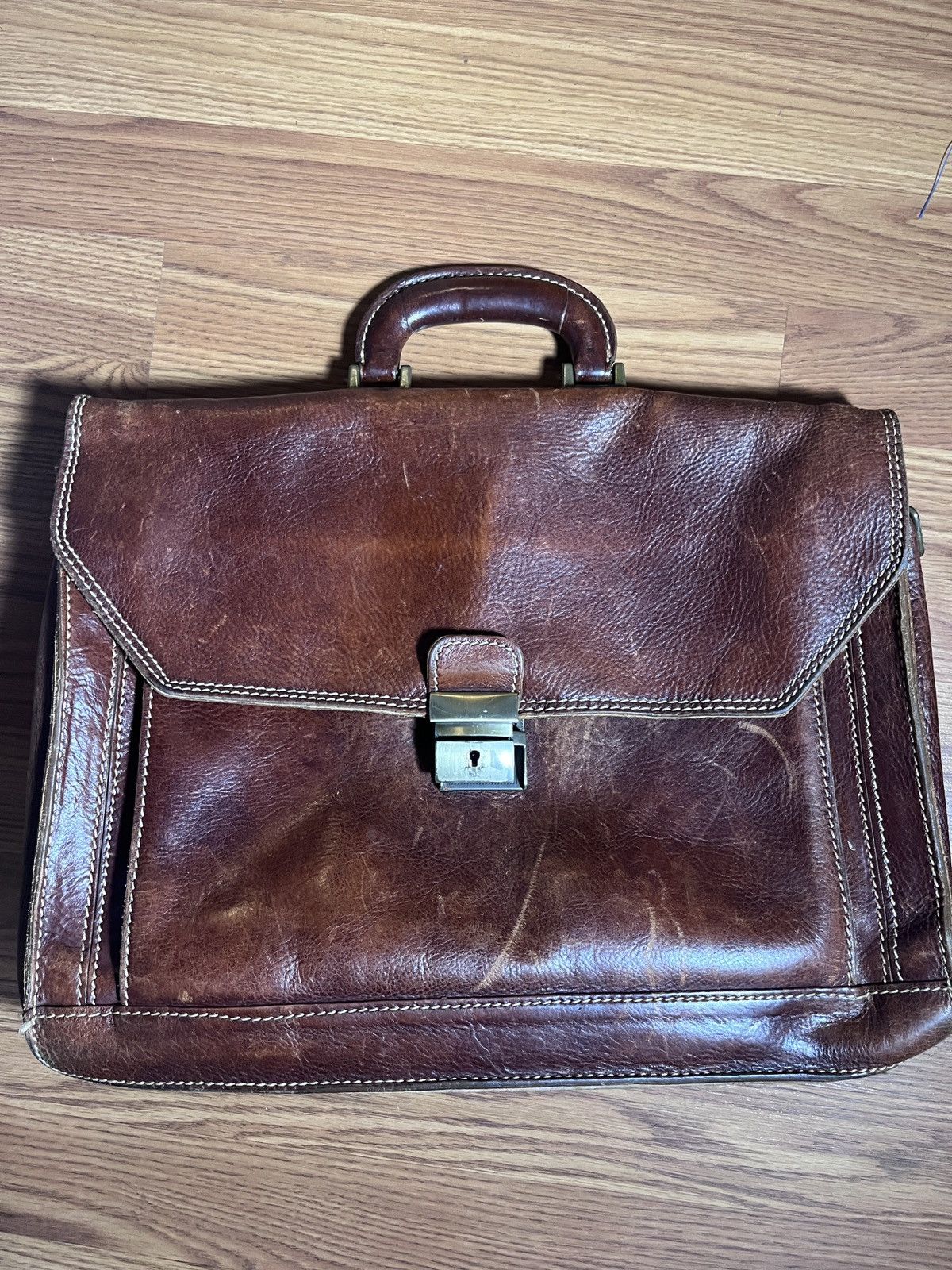Floto. Briefcase luxury butter leather
