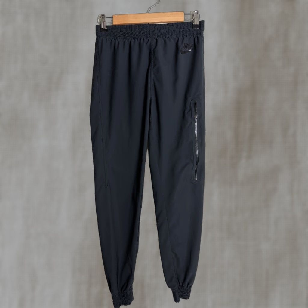 Nike Nike Women's XS Black Bonded Woven Cuffed Jogger Pants 614913-010 Athletic Track Pants Jogger Womens XS Black Solid 27in Inseam Nike Dri-FIT Size 26" / US 2 / IT 38 - 1 Thumbnail
