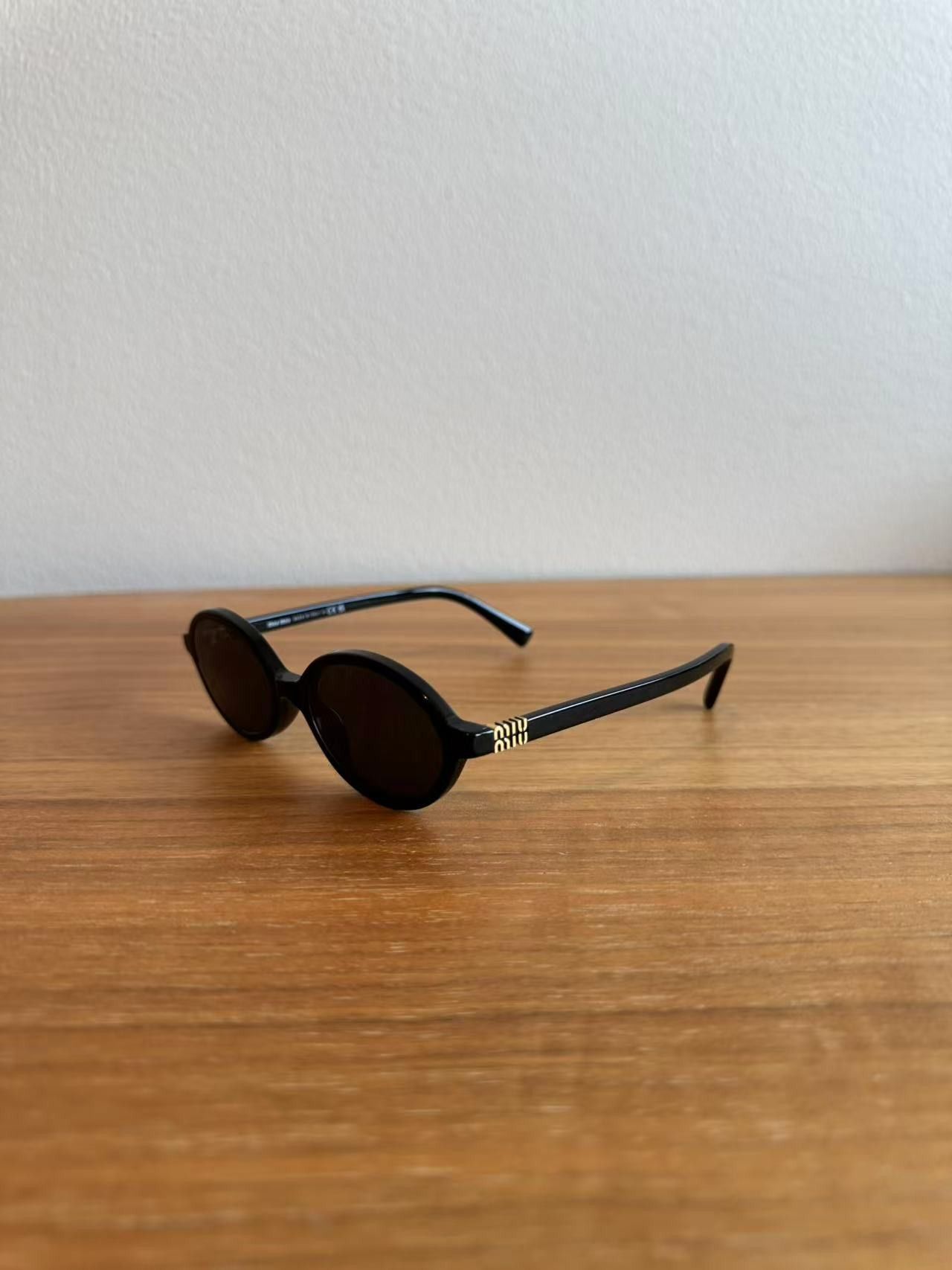 Miu Miu Miu Miu MU04ZS 1AB5S0 Sunglasses Size ONE SIZE - 1 Thumbnail