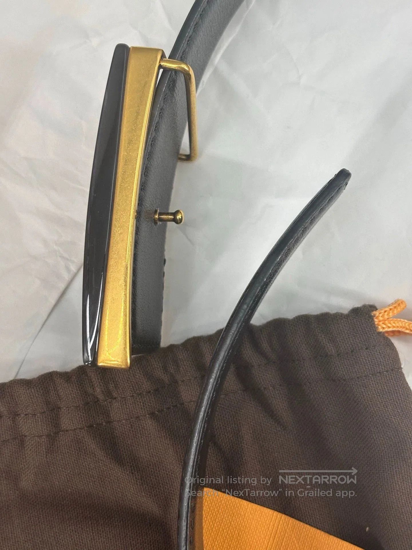 Tod's Black Leather Belt with Gold Logo.