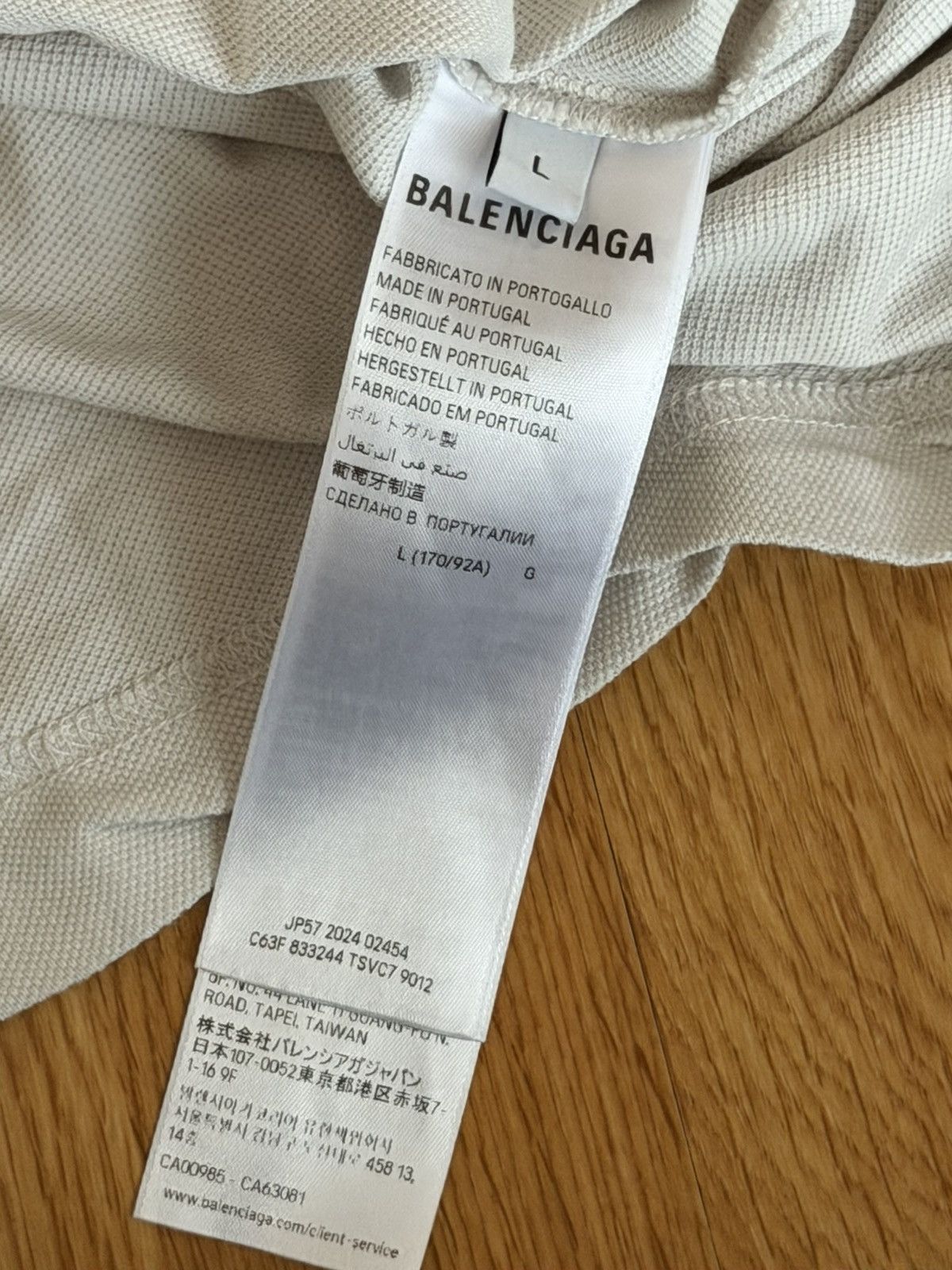 Balenciaga Balenciaga Distressed embroidered cotton-piqué polo shirt Size US L / EU 52-54 / 3 - 4 Thumbnail