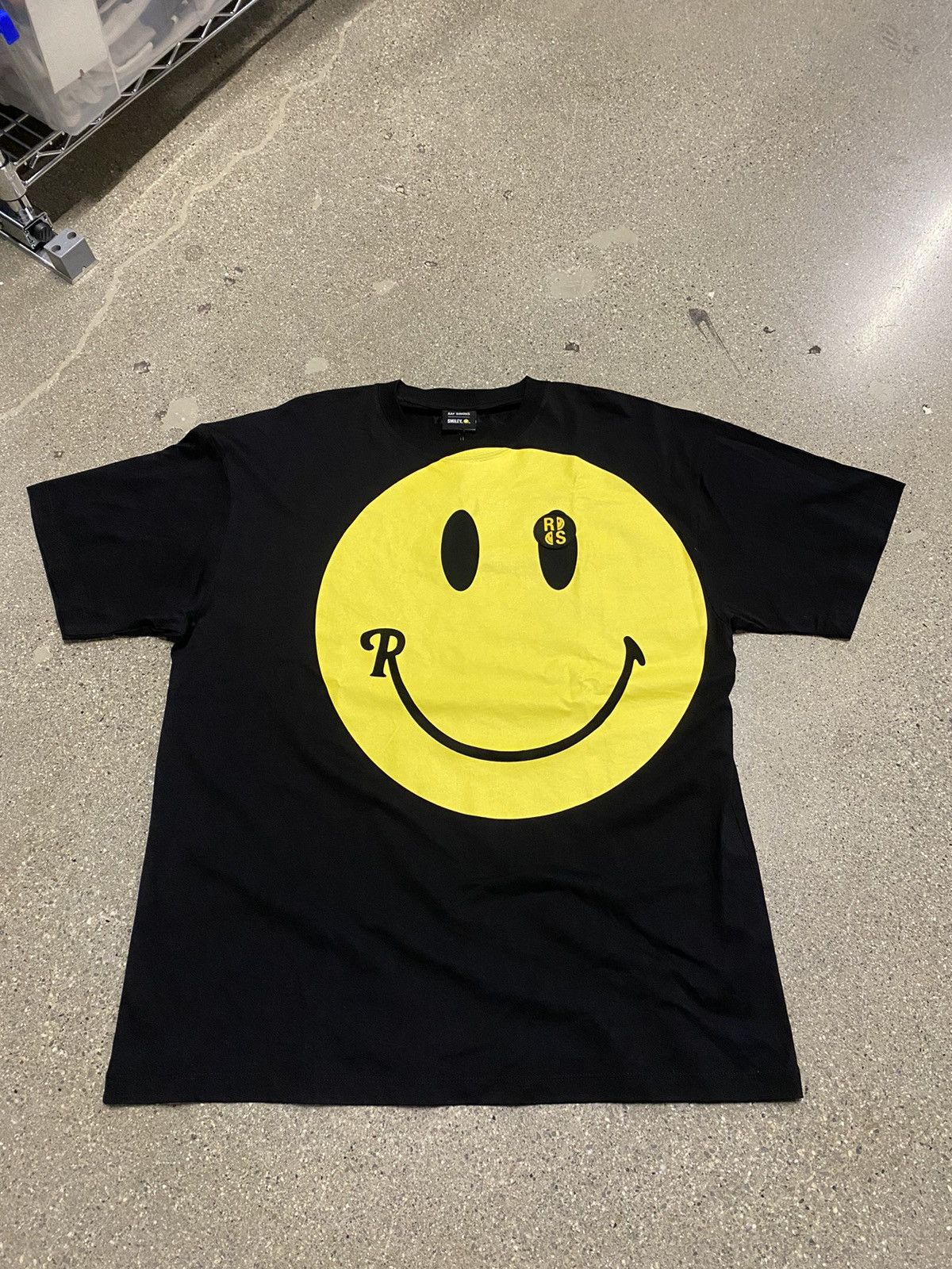 Raf Simons Raf Simons Black Smiley Edition Graphic Tee | Grailed