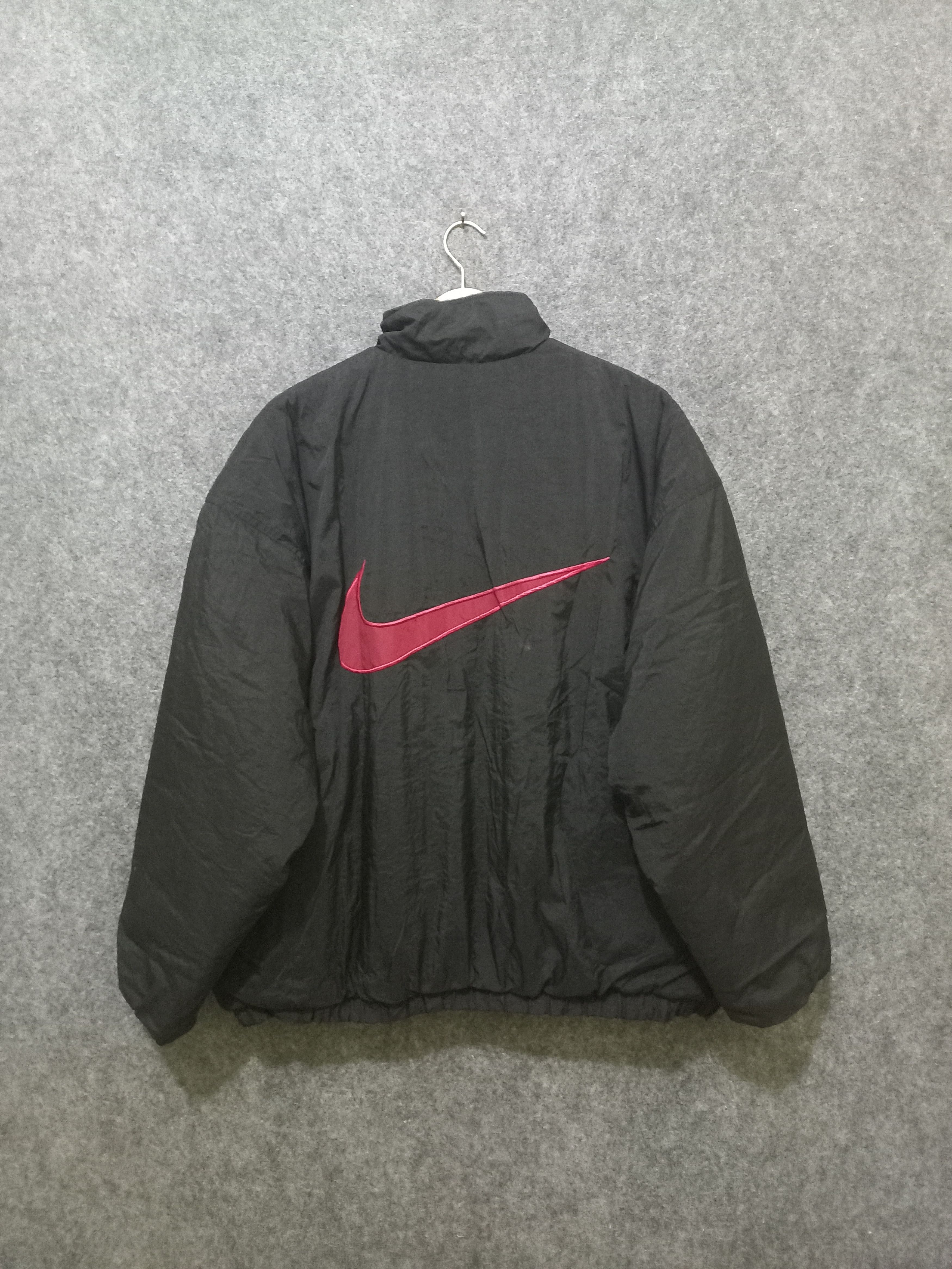 image of Nike Big Swoosh Reversible Bomber Jacket in Black Red, Men's (Size Large)