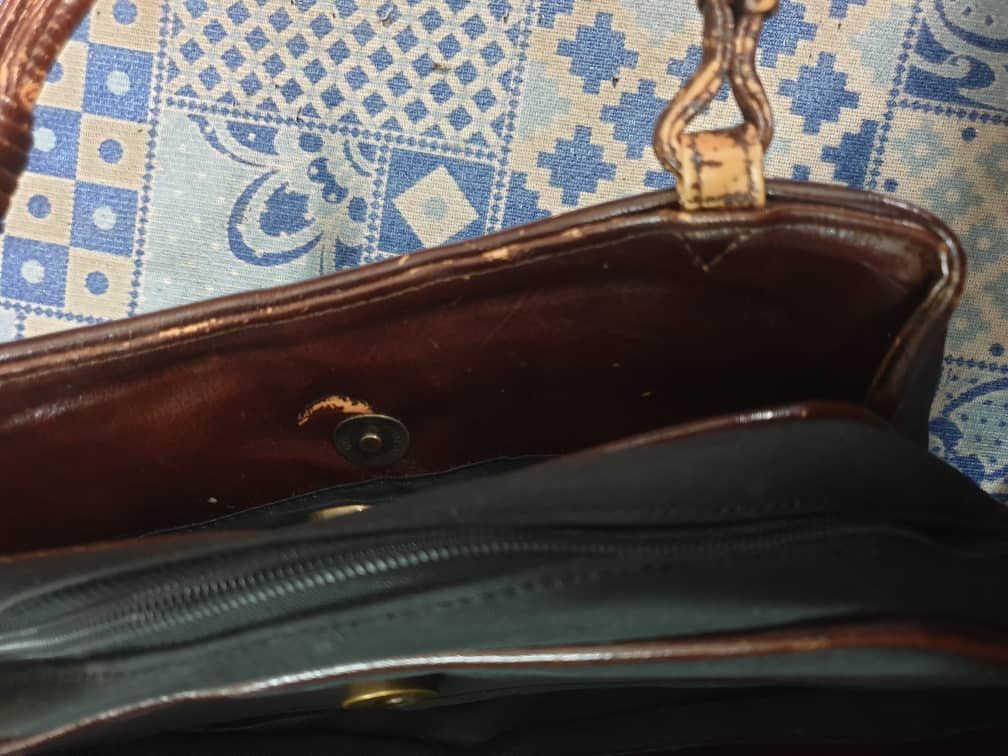 Gianni Valentino black colour carry bag
