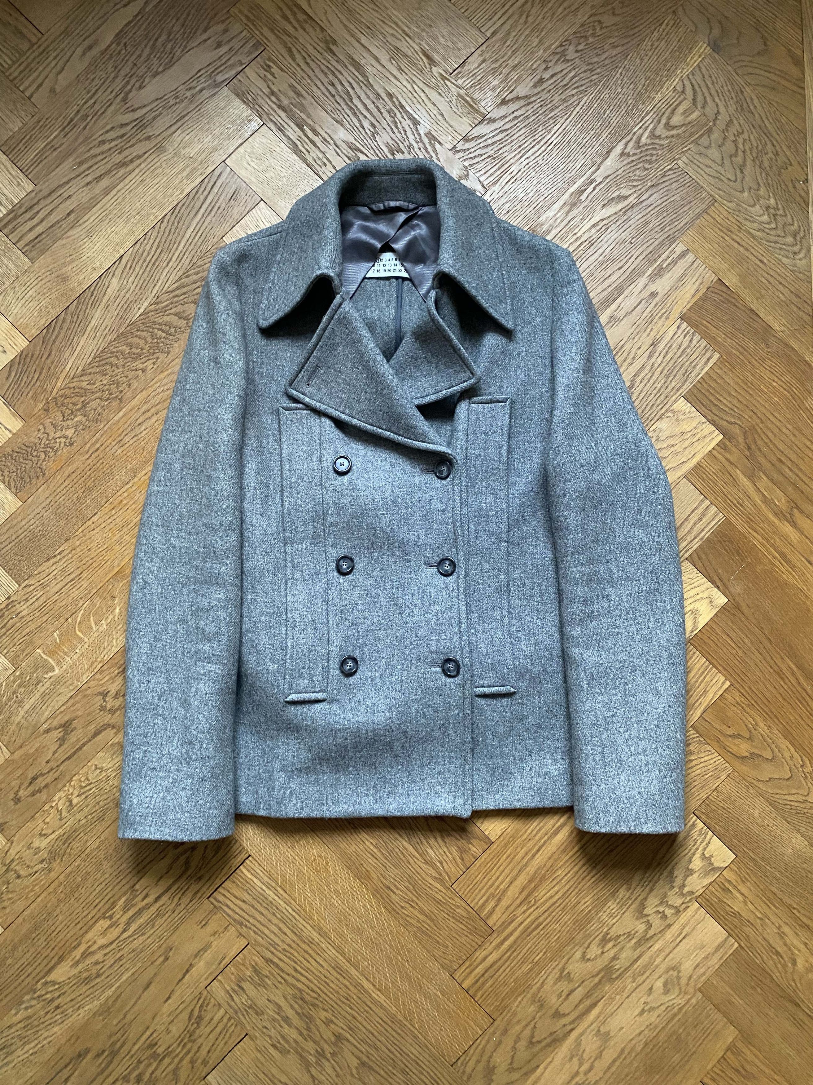Martin Margiela ⓪⑩ Artisanal coat New Year vibe from Martin Margiela: the tinsel coat from Maison