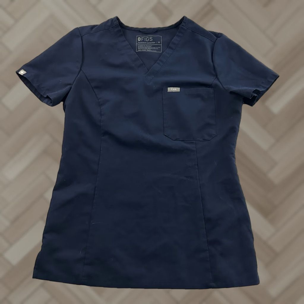 Vintage FIGS Technical Catarina One Pocket Short Sleeve Scrub Top Women's XS Blue Shirt Womens XS Blue FIGS Catarina One Pocket Short Sleeve Scrub Top Size XS / US 0-2 / IT 36-38 - 1 Thumbnail