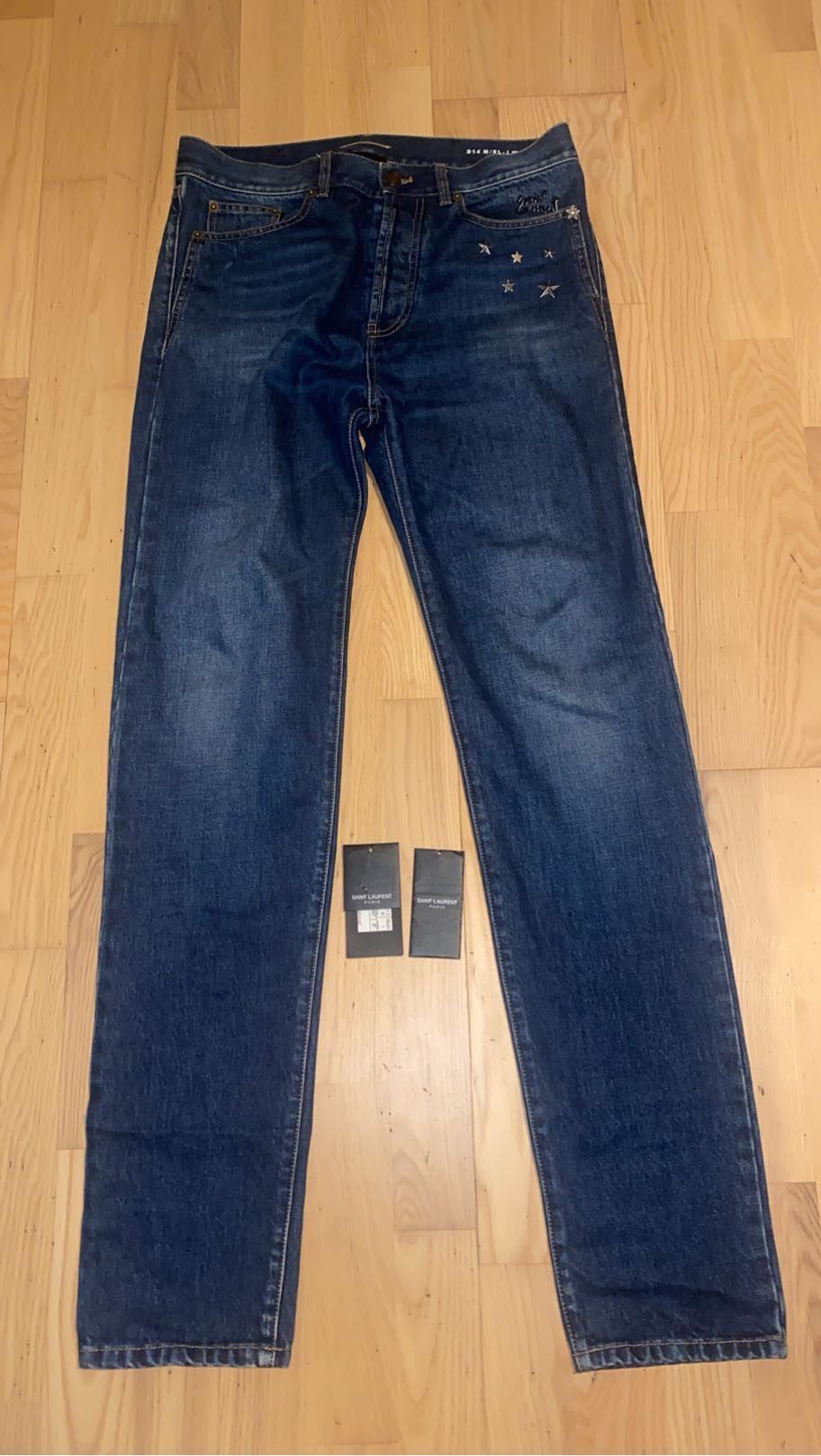 image of Saint Laurent Paris Saint Laurent Star Denim in Blue, Men's (Size 32)