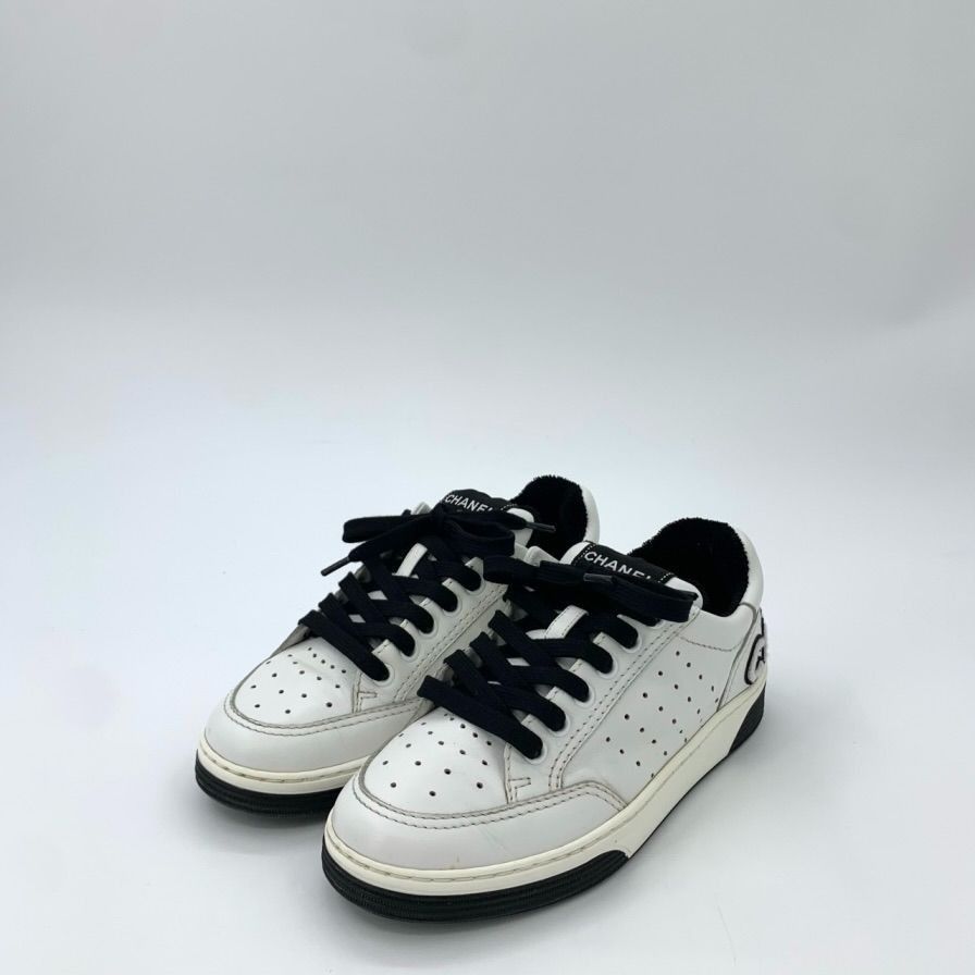 Chanel White Leather Sneakers With Black Laces & Logo Detail