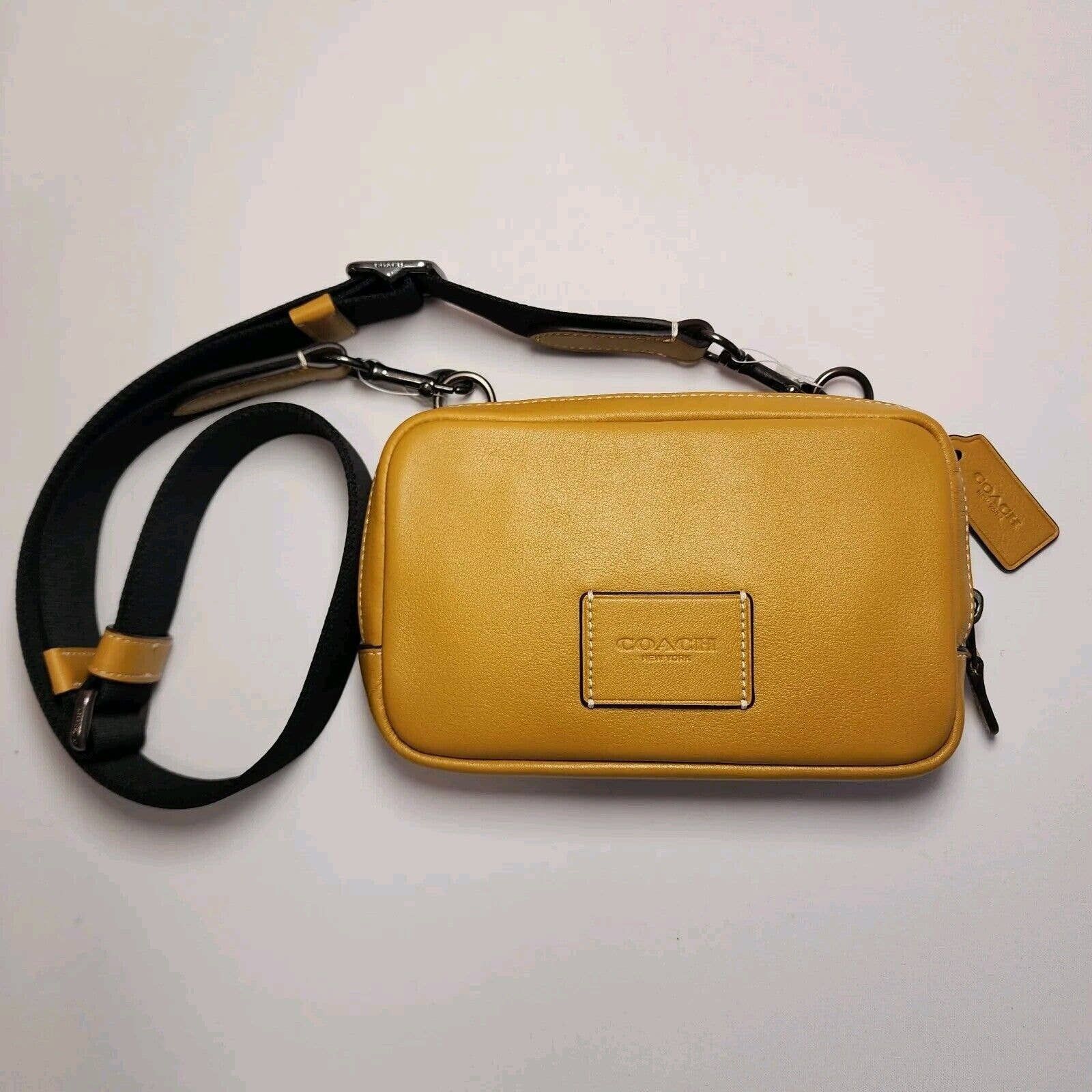 image of Coach Oach Cm170 Carrier Phone Crossbody Leather Yellow Flax, Men's