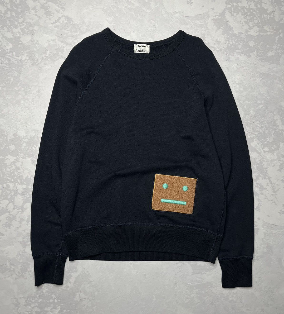 image of Acne Studios College Face Square Patch Pullover Sweatshirt in Blue, Men's (Size Small)