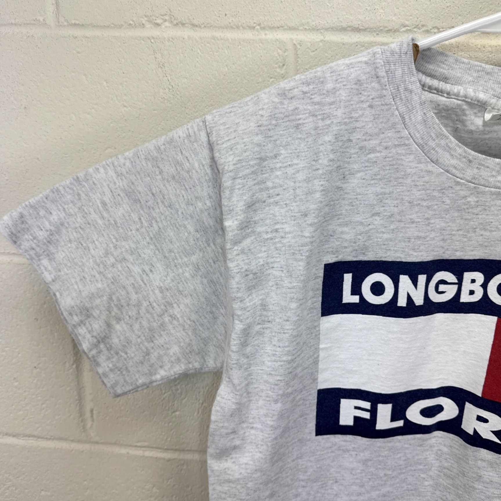 Tommy Hilfiger Vintage Murina LONGBOAT KEY FLORIDA T-SHIRT Gray Unisex Adults L Crew Neck Short Sleeve 90s USA Flag Graphic Floral Pattern? Wait no dais. Size US L / EU 52-54 / 3 - 6 Thumbnail
