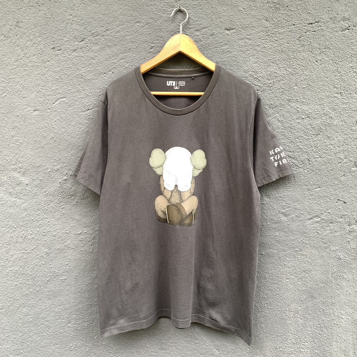 image of Thrashed Faded Kaws x Uniqlo Tee in Black, Men's (Size XL)